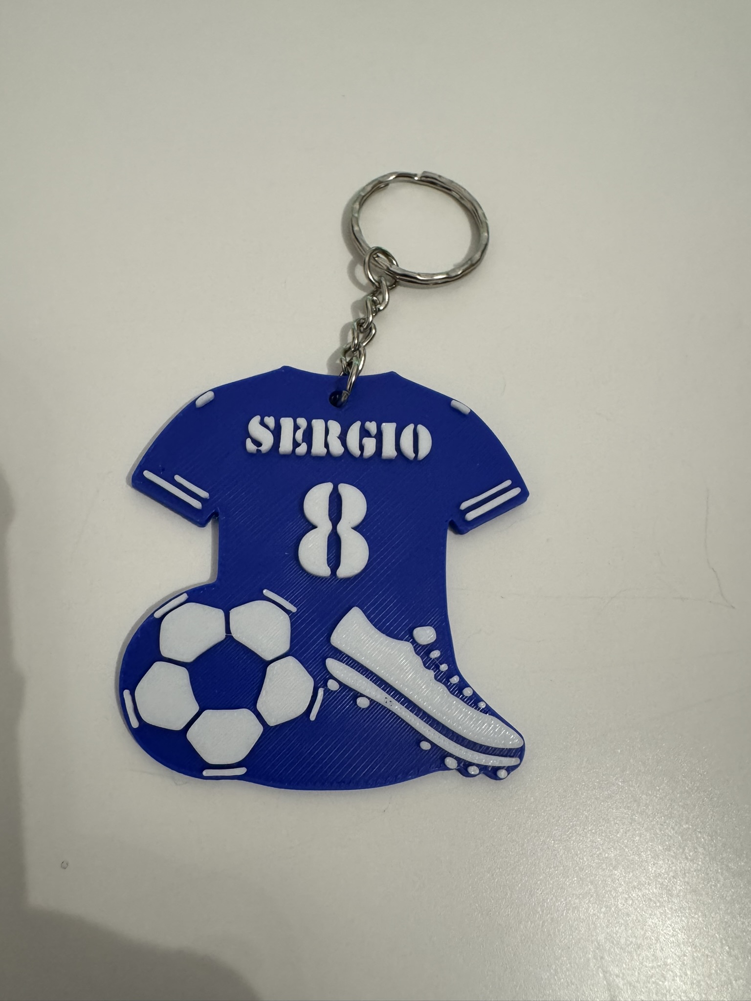 Llavero de camiseta de fútbol y balancesto