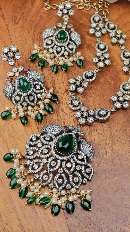 Grand Green Stone Antique Necklace Set with Peacock-Inspired Pendant Design