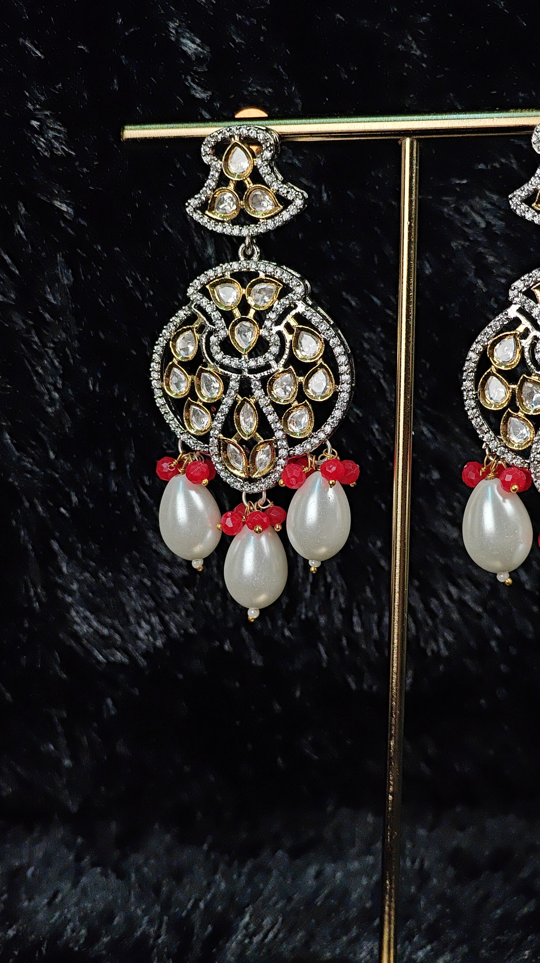 Opulent Kundan Chaandbali Earrings with Red Bead Accents