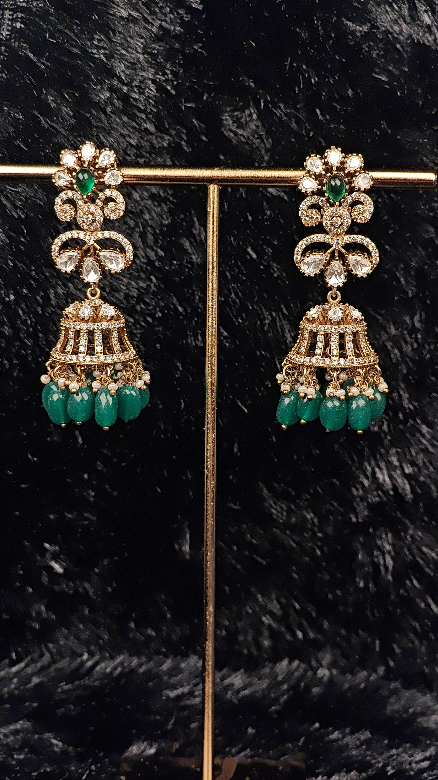 Green Kundan Jhumka Earrings with Pearl Detailing