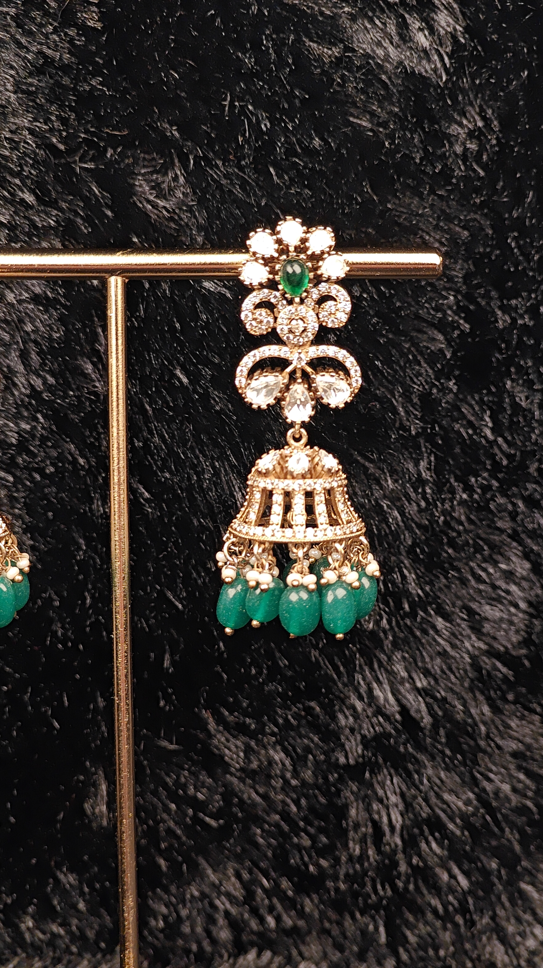 Green Kundan Jhumka Earrings with Pearl Detailing