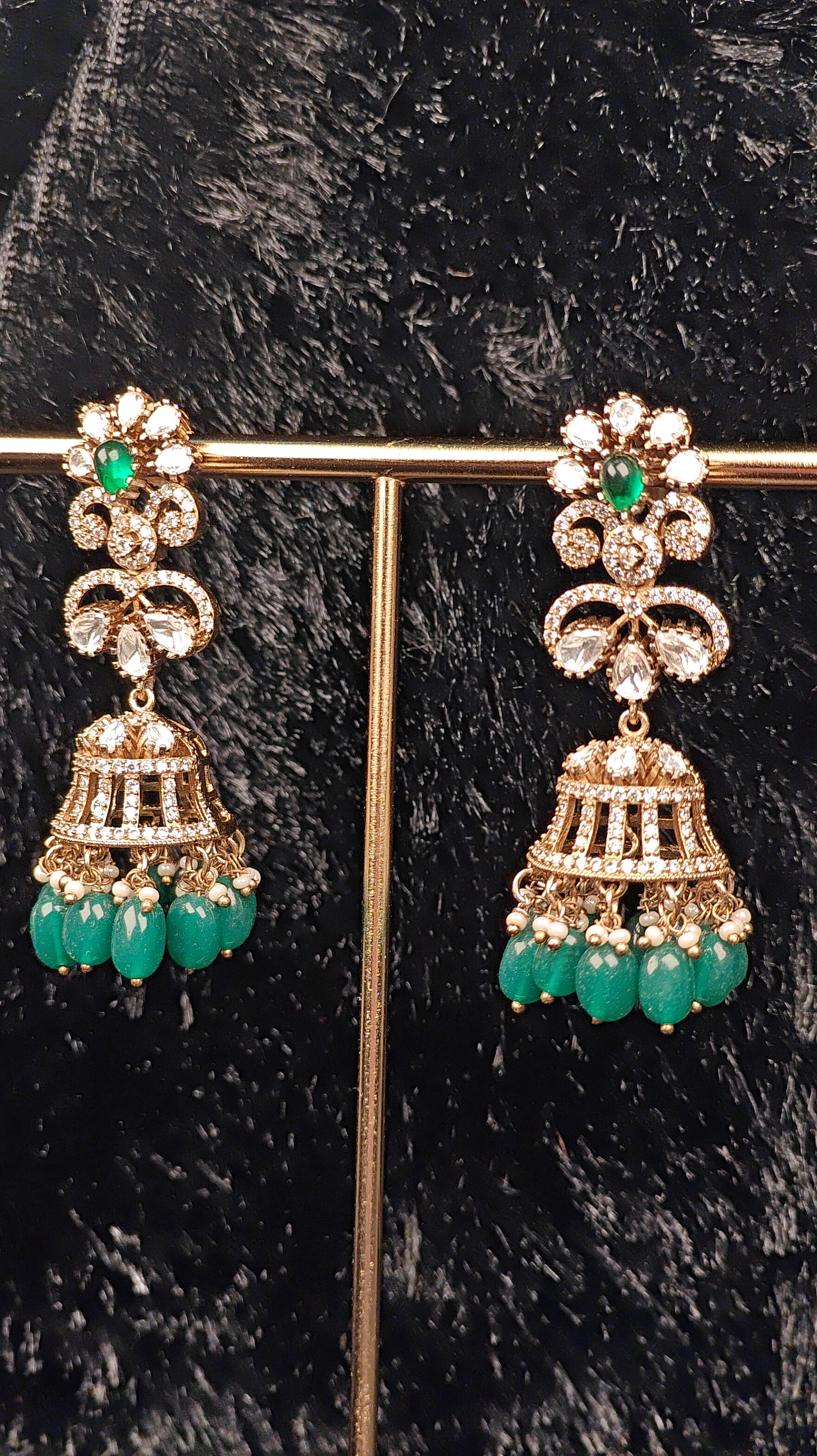 Green Kundan Jhumka Earrings with Pearl Detailing
