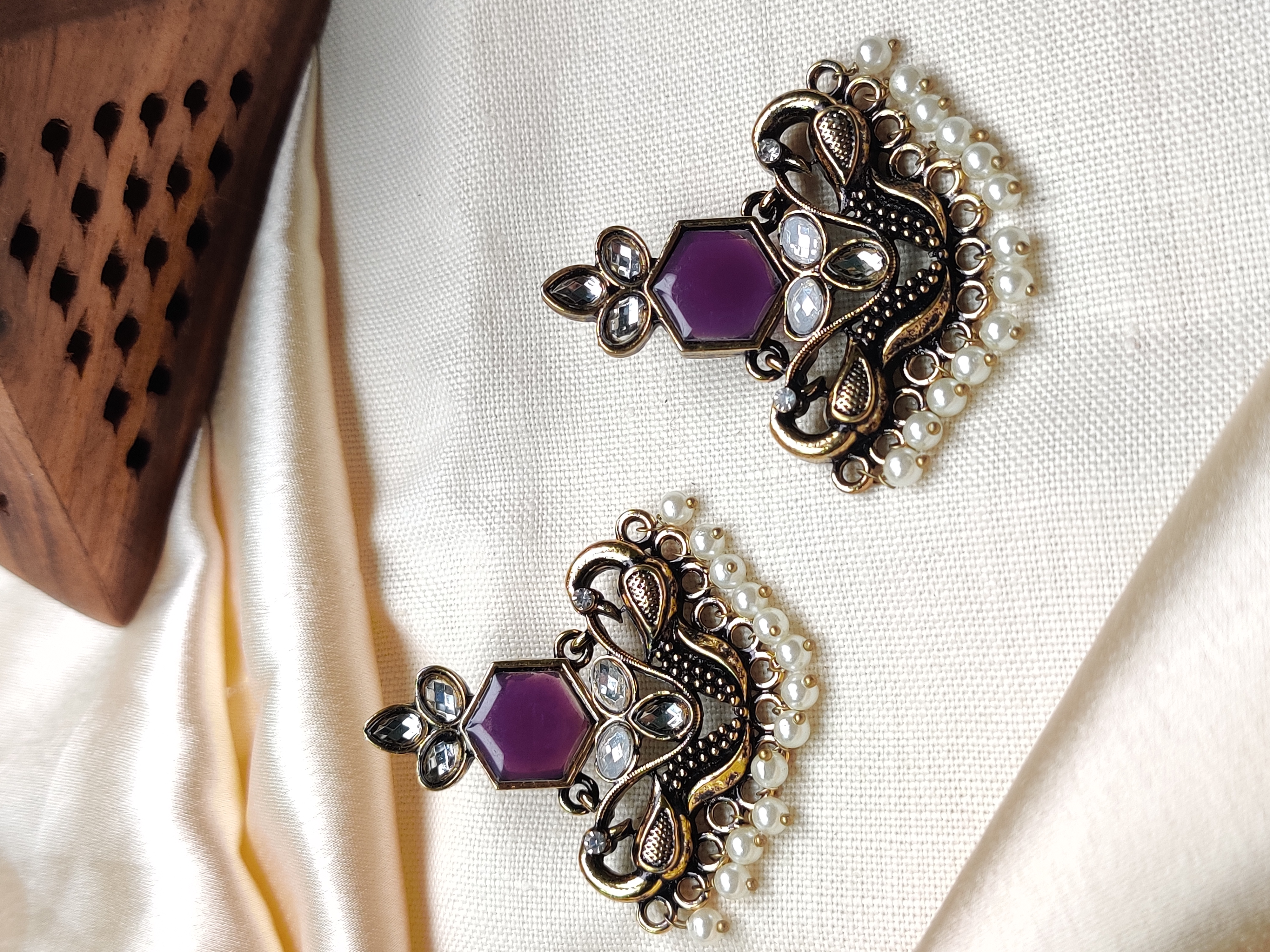 Golden peacock earrings with purple stone & pearl drops