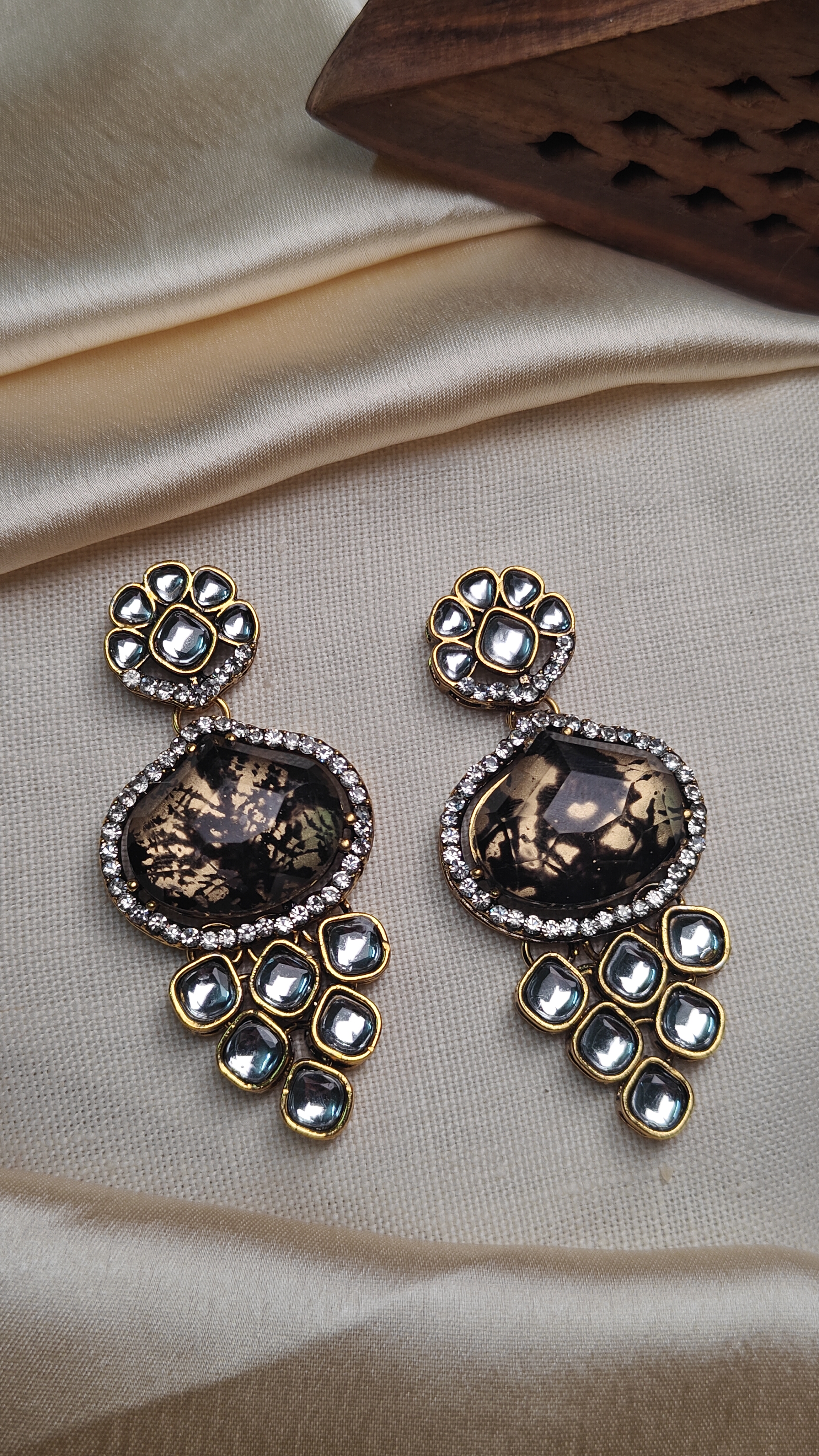 Luxury kundan studded earrings with black mirror stone