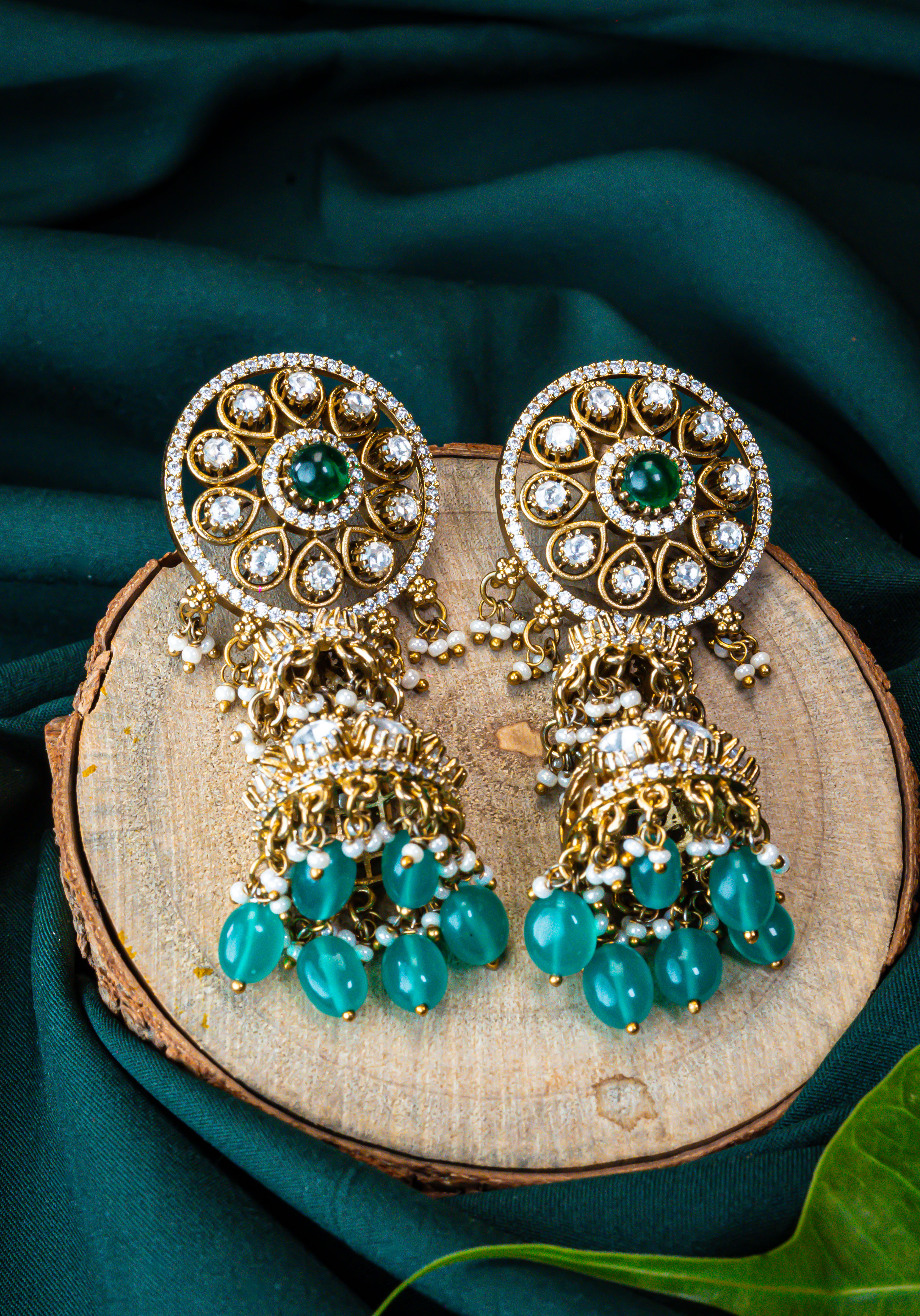 Emerald Spark Kundan Jhumkis