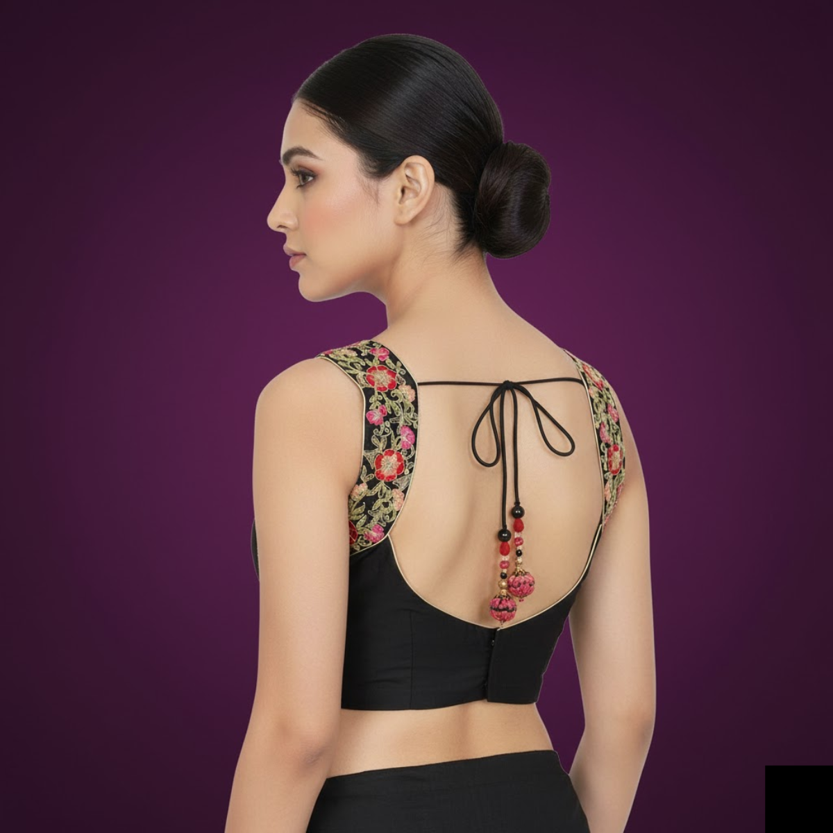  Blossom Black Sleeveless Blouse with Intricate Floral Ari Embroidery.