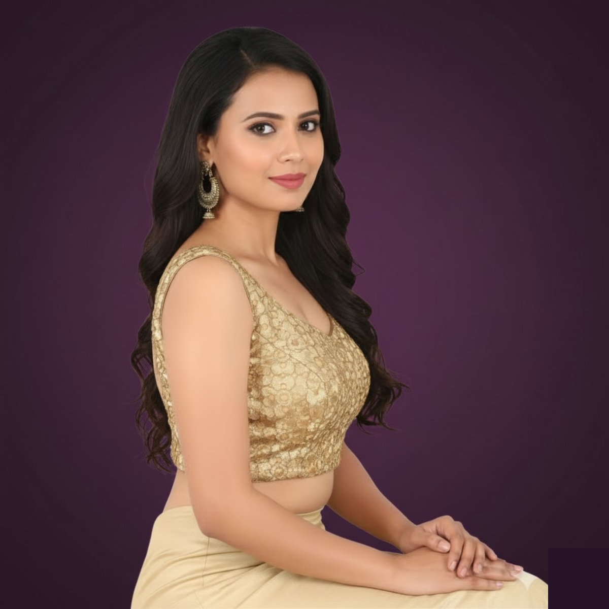 Elegant gold U-neck sleeveless brocade blouse with side opening.