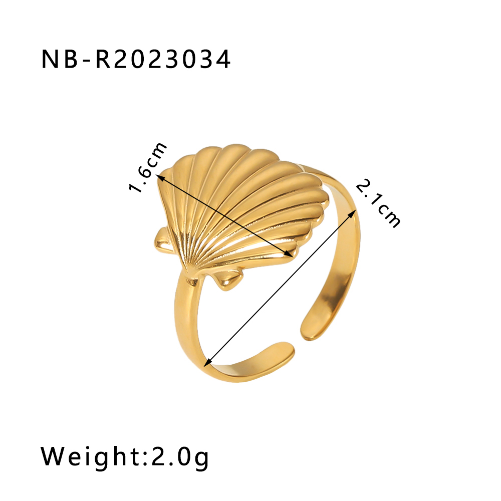 Anillo de oro concha marina