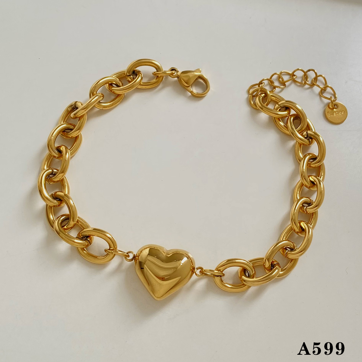 Pulsera de cadena dorada con colgante de corazón