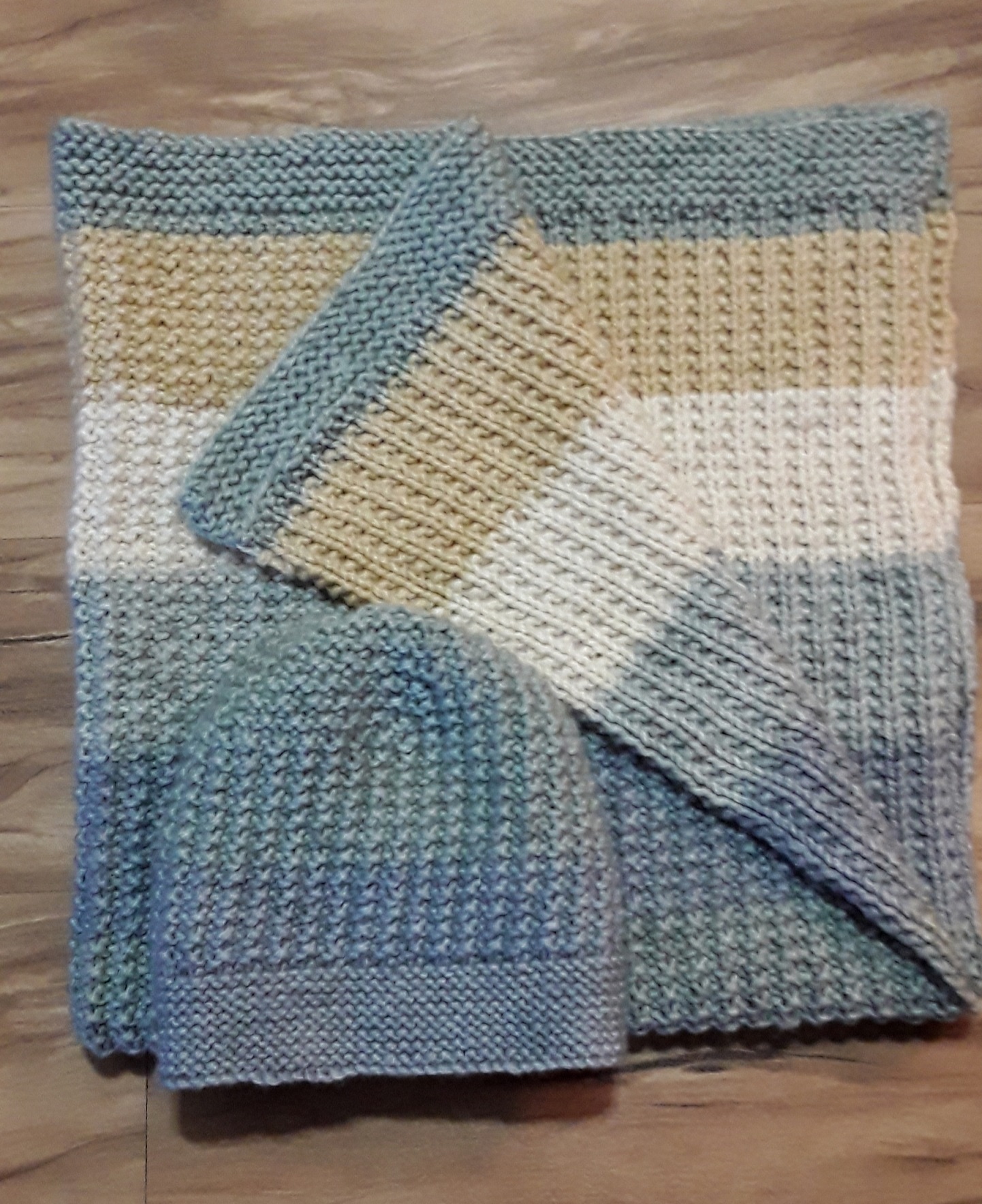 Reversible blanket and hat set