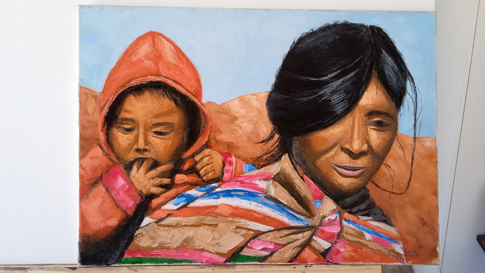 Madre aymará con su hijo