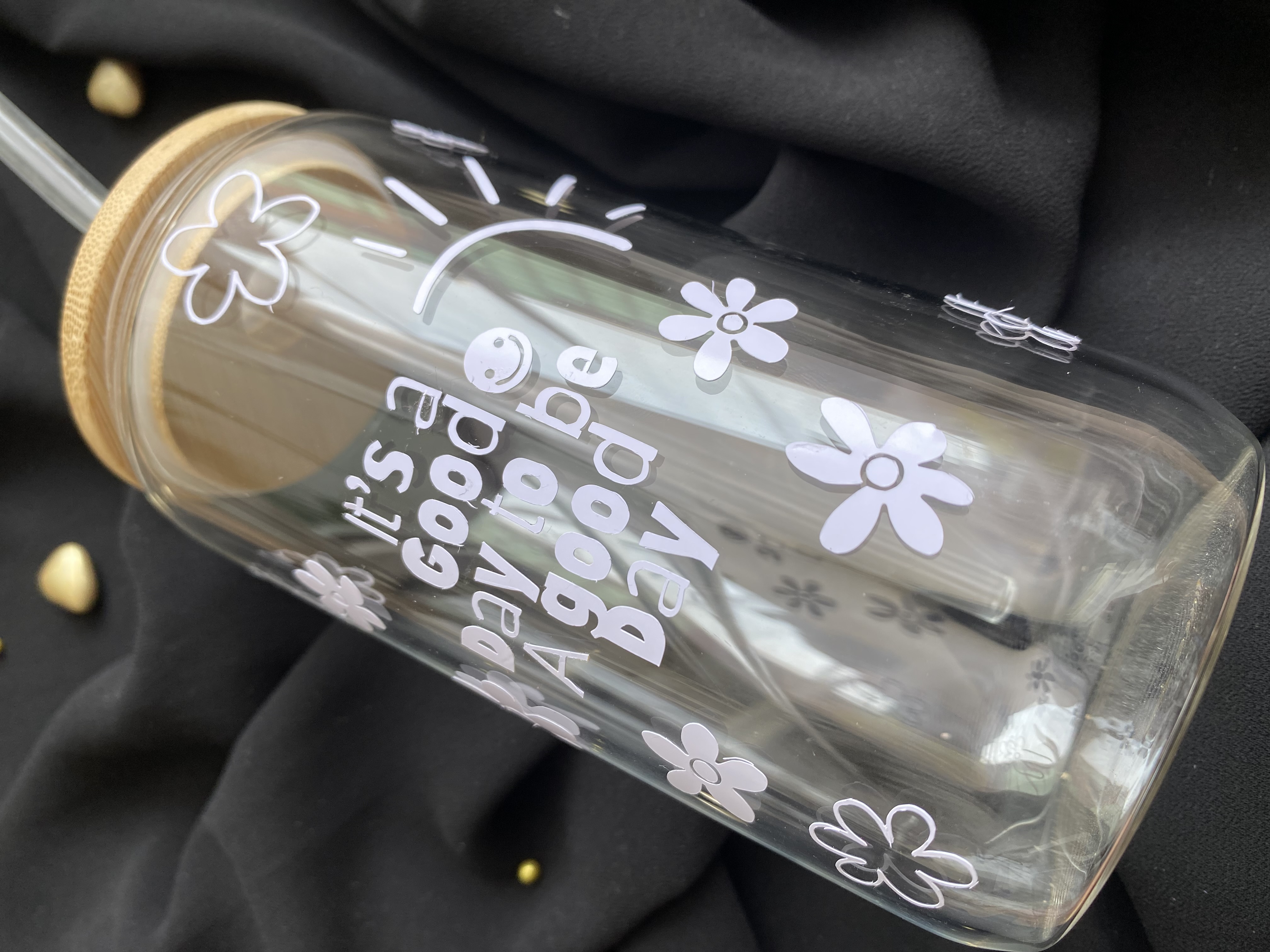 gourde en verre avec paille