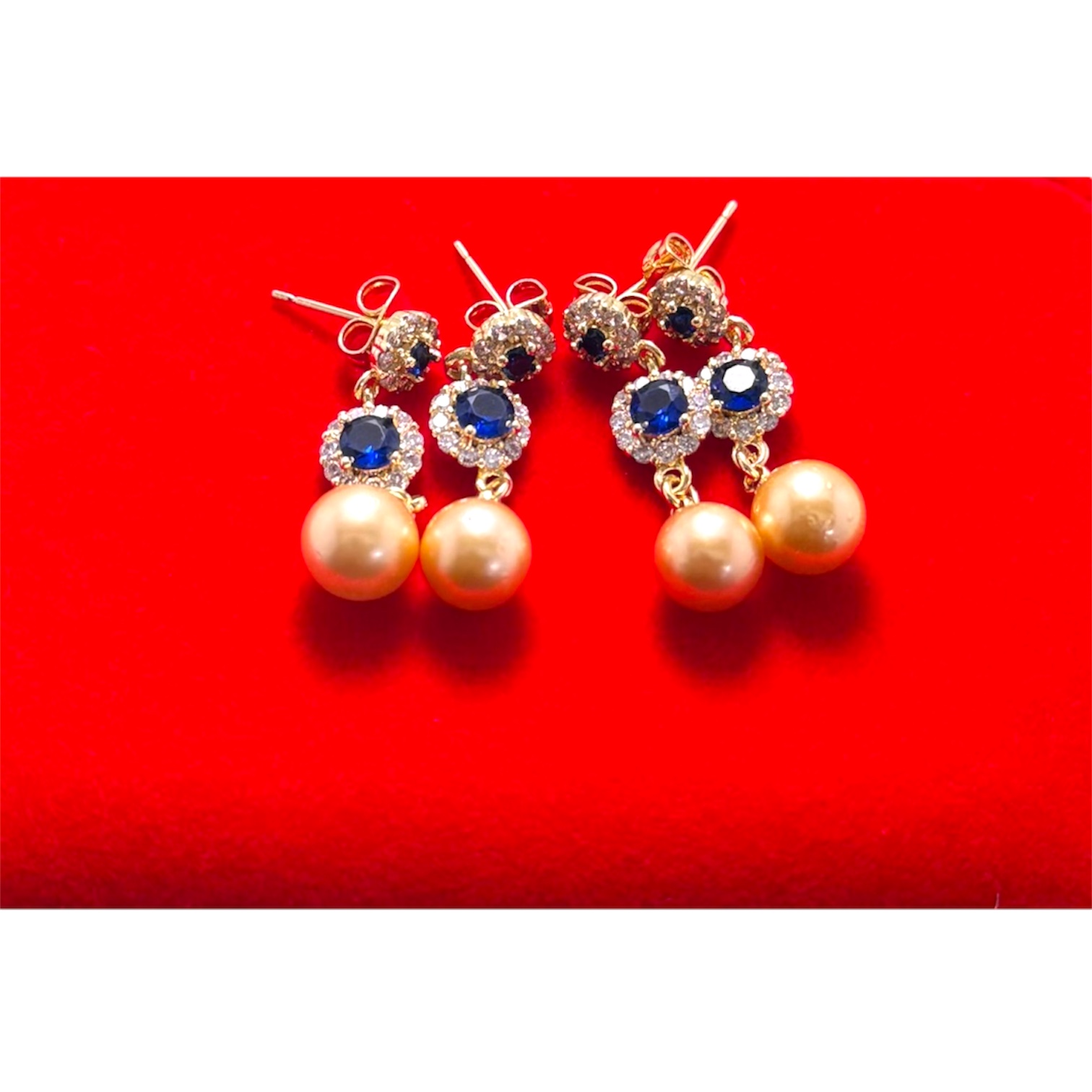 Pendientes de perlas y piedras azules
