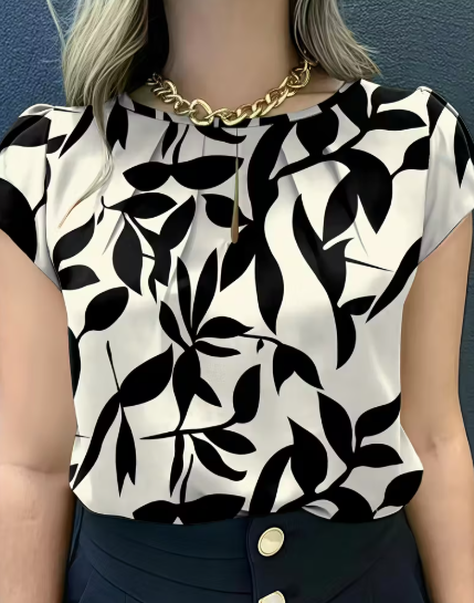 BLUSA BLANCA CON HOJAS NEGRAS