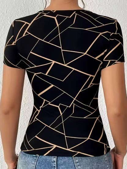 BLUSA NEGRA CON DISEÑO GEOMETRICO DORADO