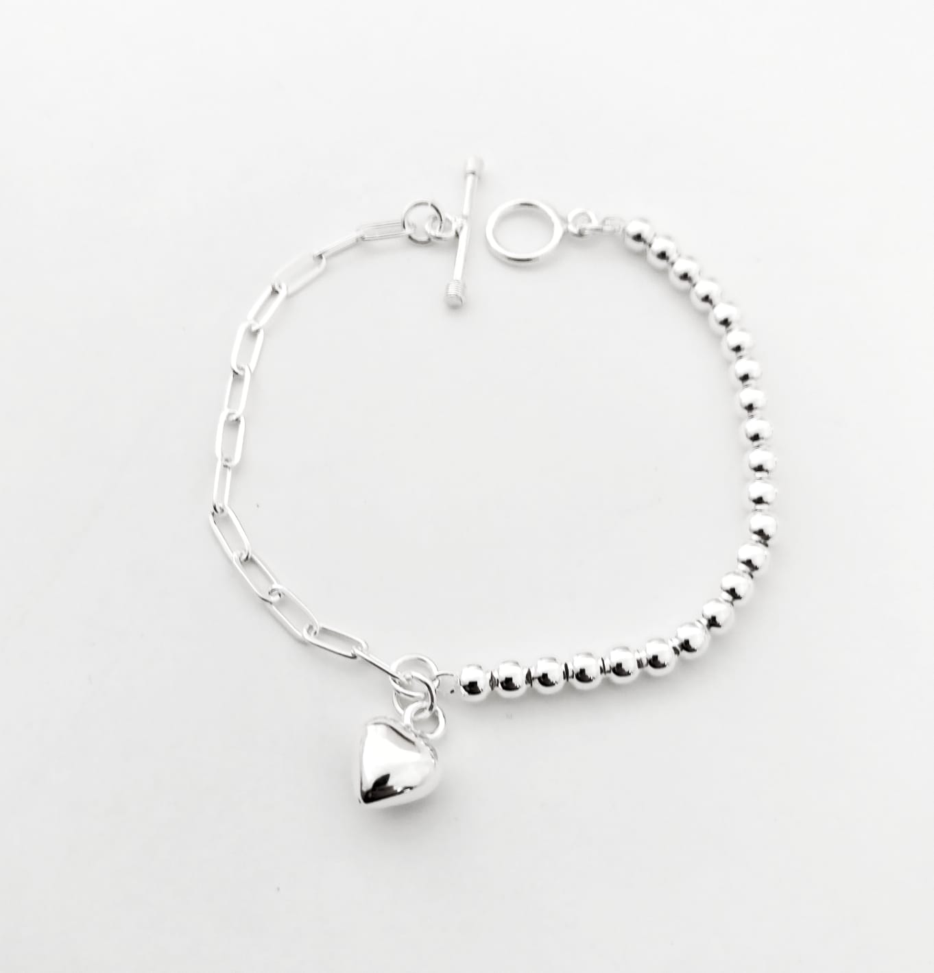Pulsera de plata con dije de corazón