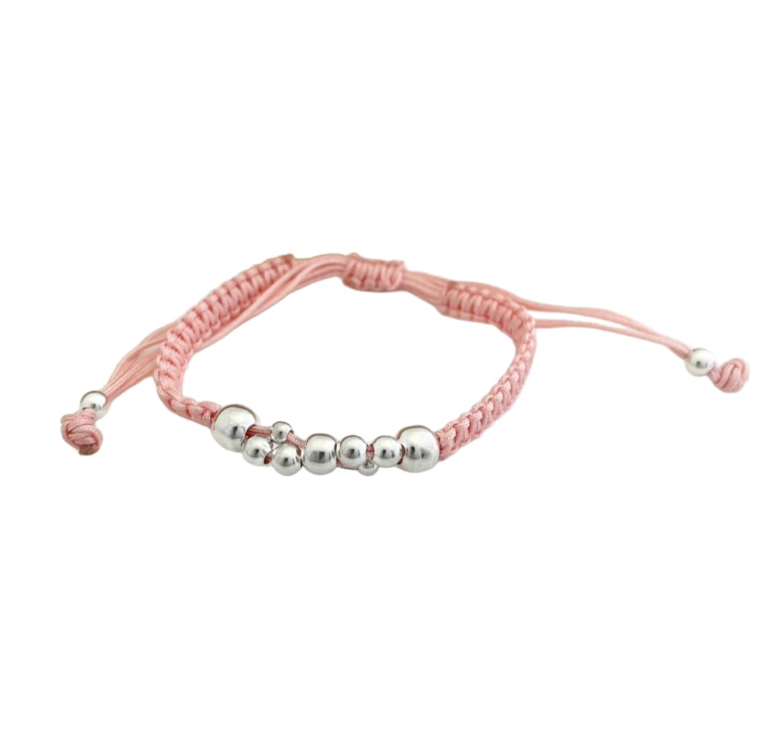 Pulsera tejida de hilo rosa con bolas de plata