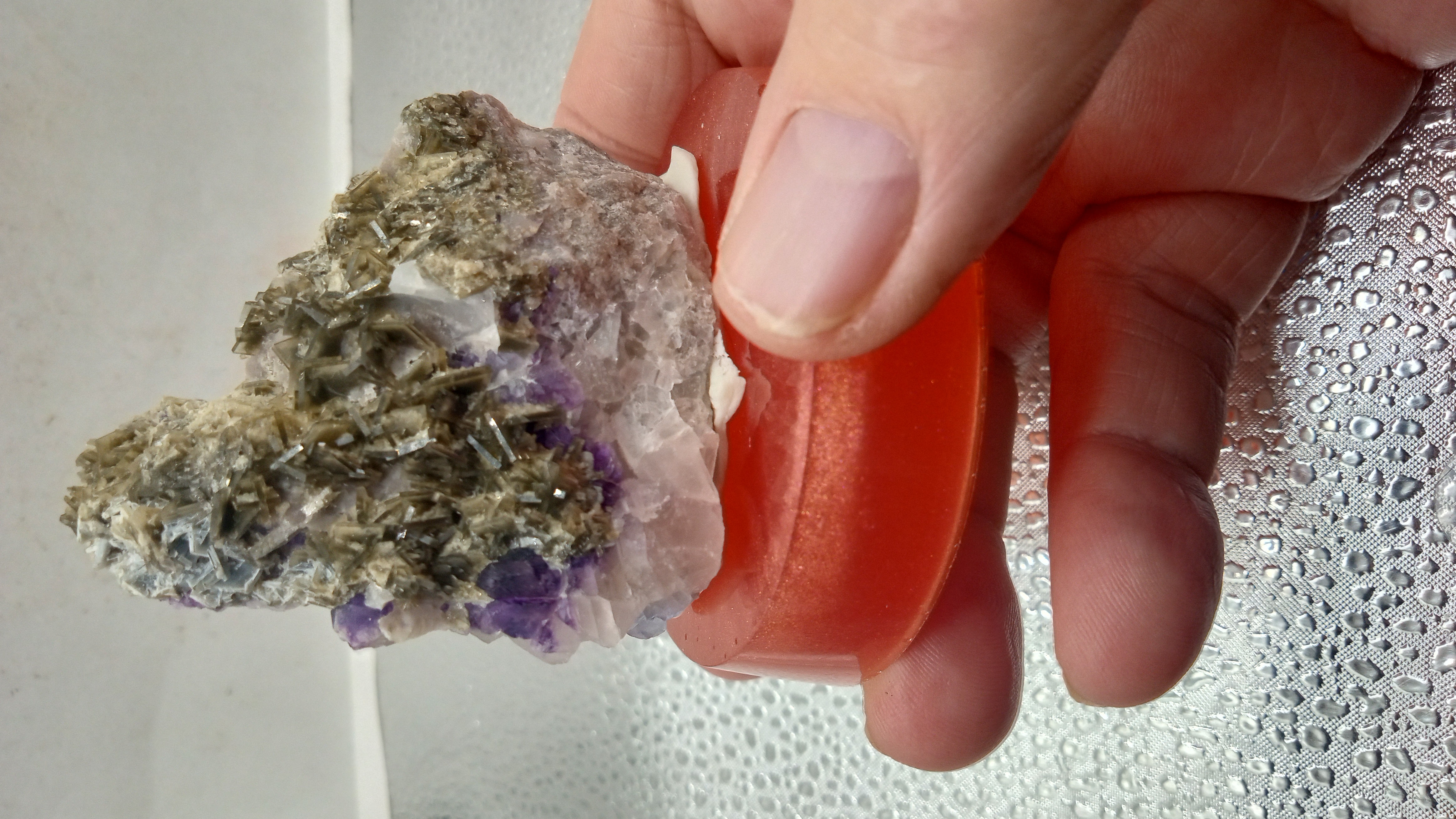 Black Siderite Mineral on Red Stand - Bisbee Arizona