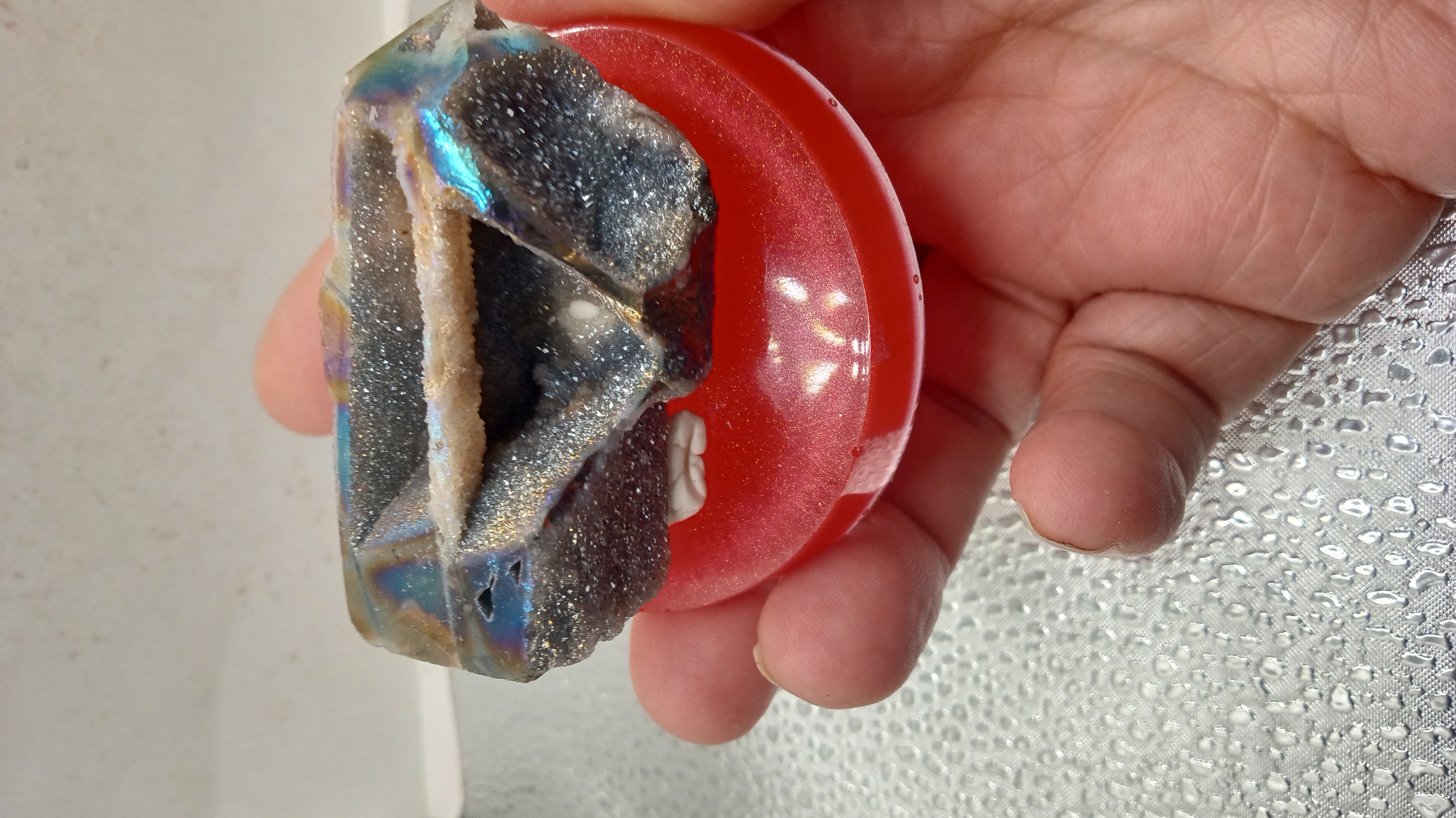 Sparkly Angel Aura Quartz on Red Stand