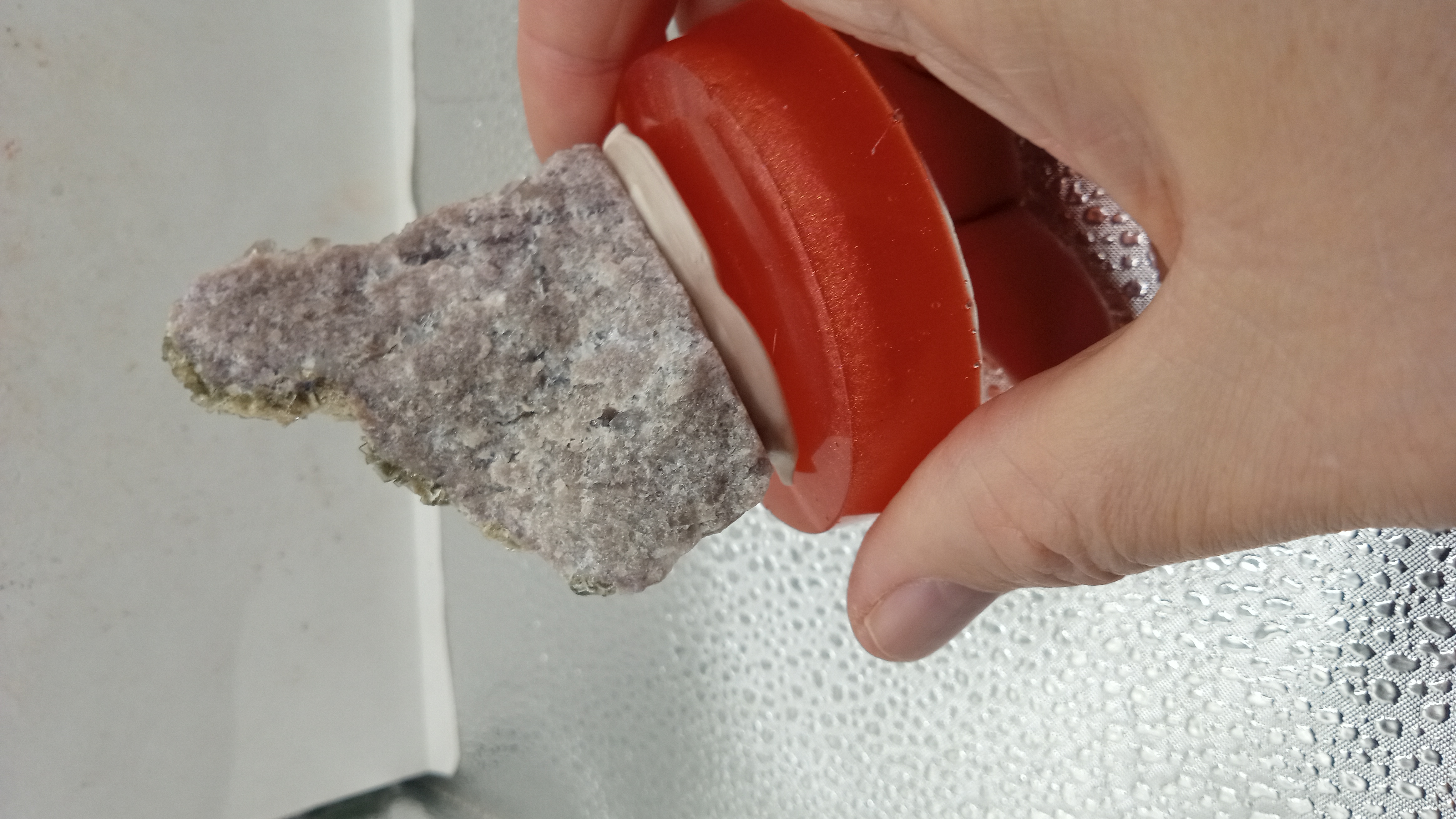 Black Siderite Mineral on Red Stand - Bisbee Arizona