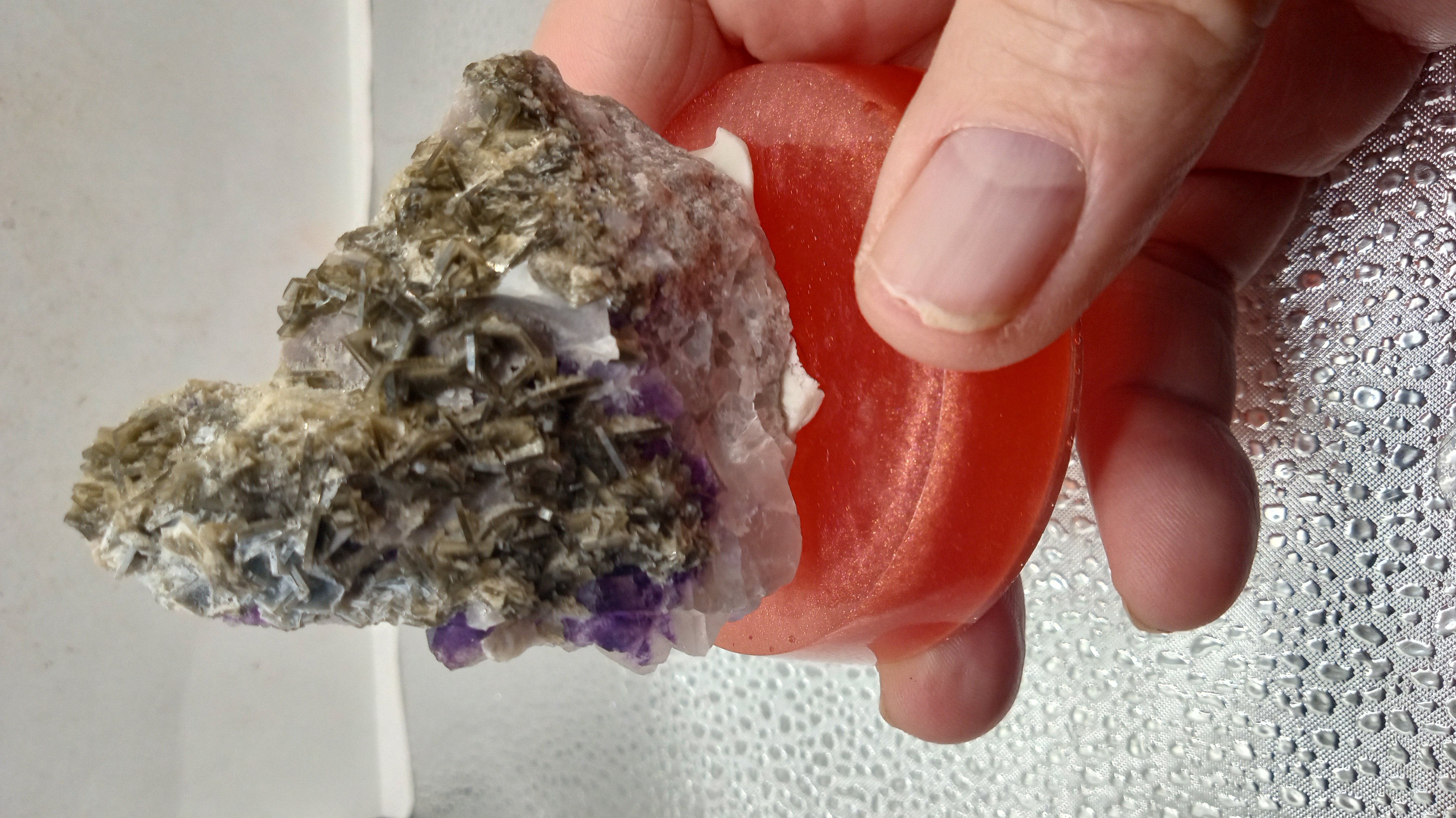 Black Siderite Mineral on Red Stand - Bisbee Arizona