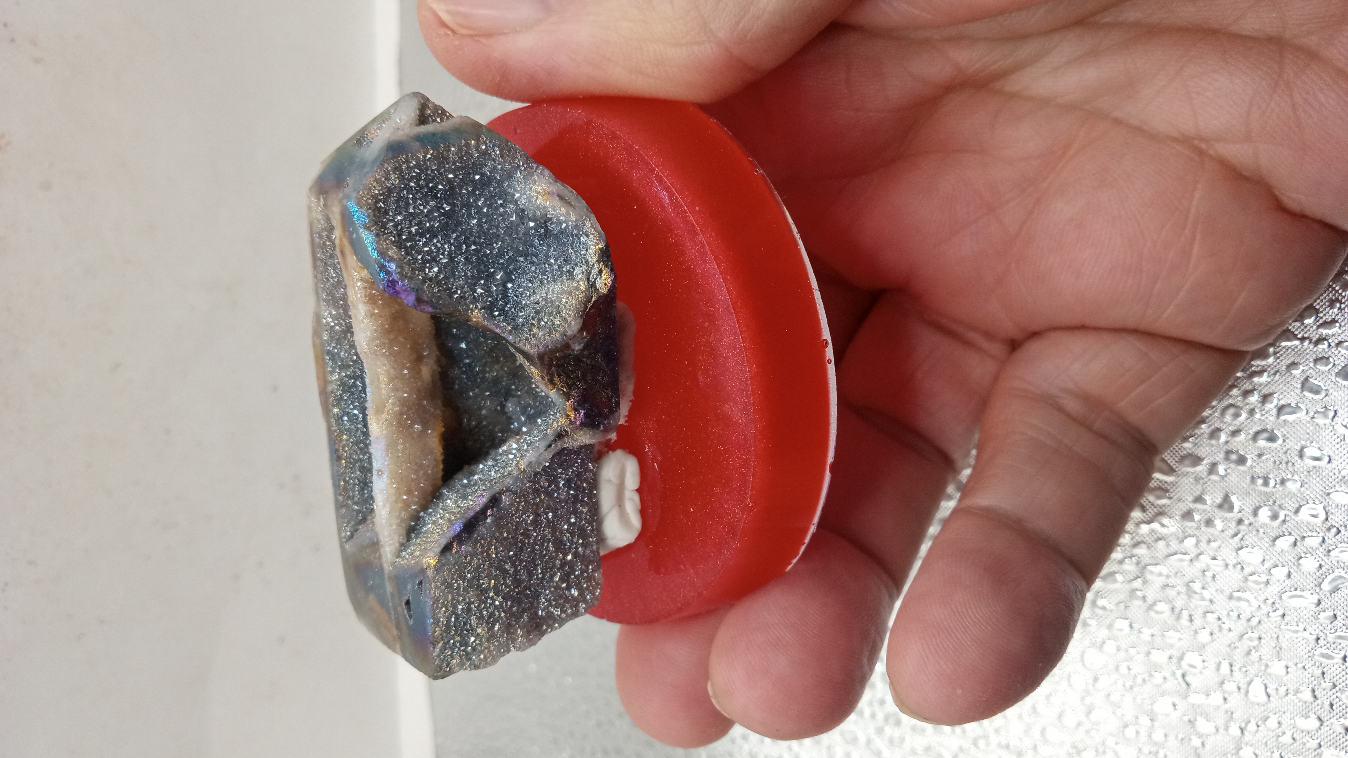 Sparkly Angel Aura Quartz on Red Stand