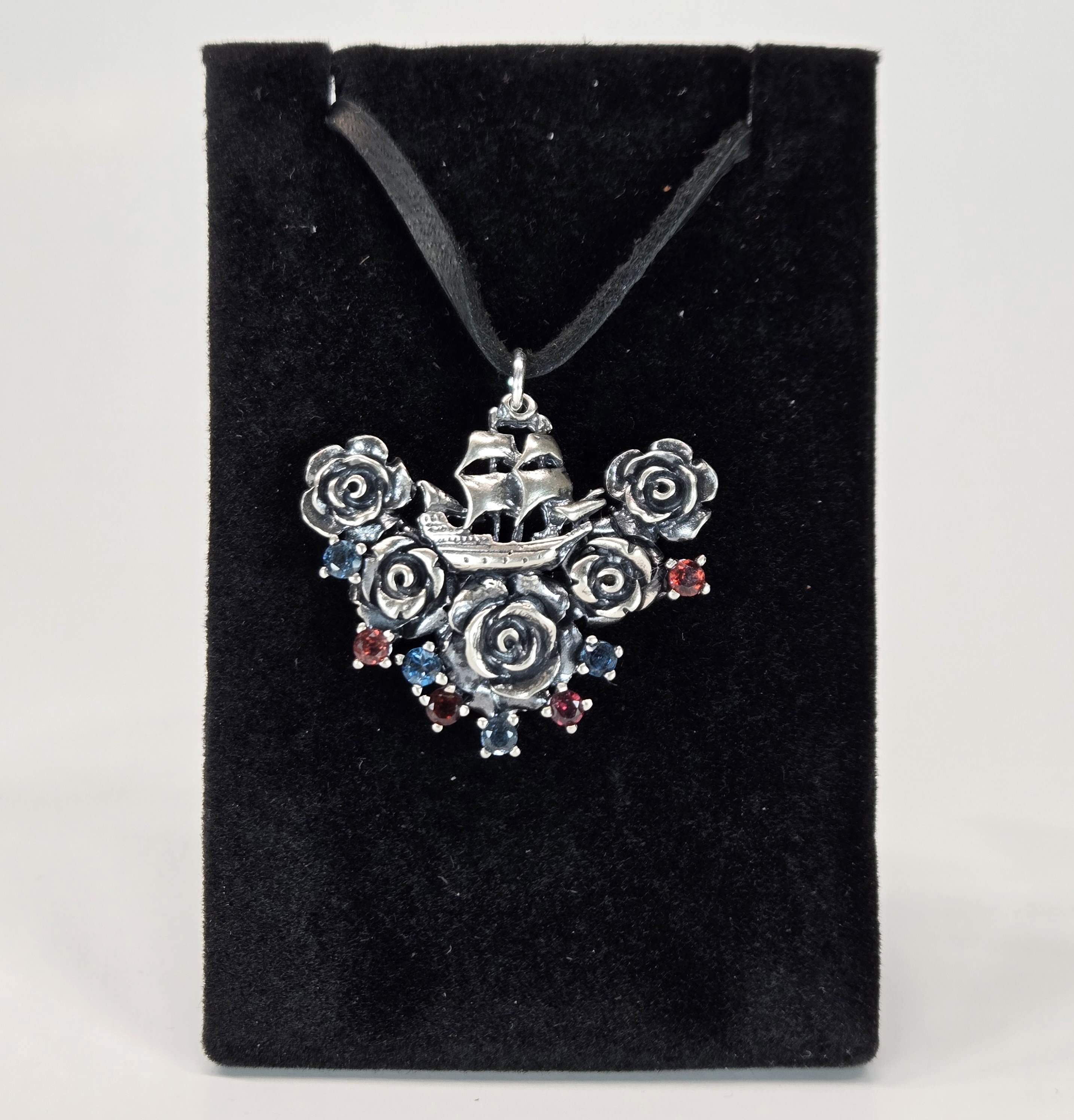 Garnet and London Blue Topaz Ship Pendant