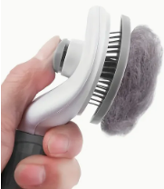 Cepillo para mascotas Feniuz con botón saca Pelo fácil