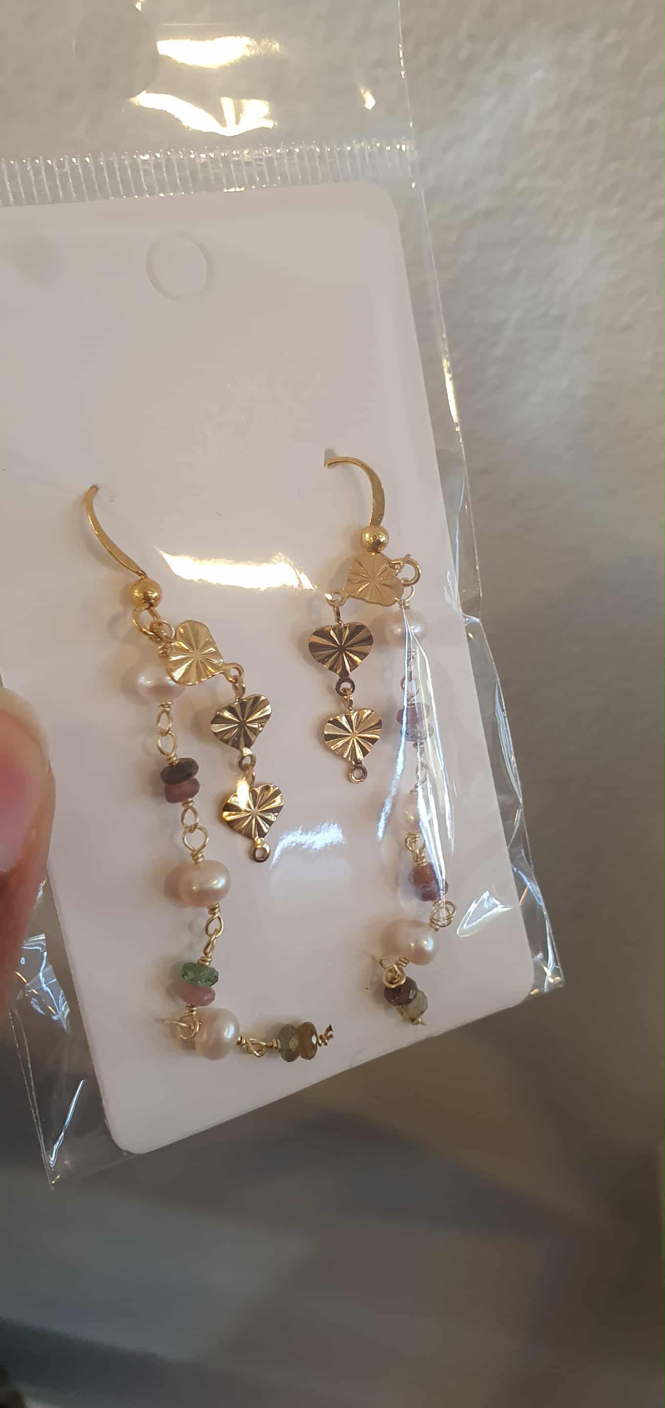 Guldøreringe med blomstermotiver