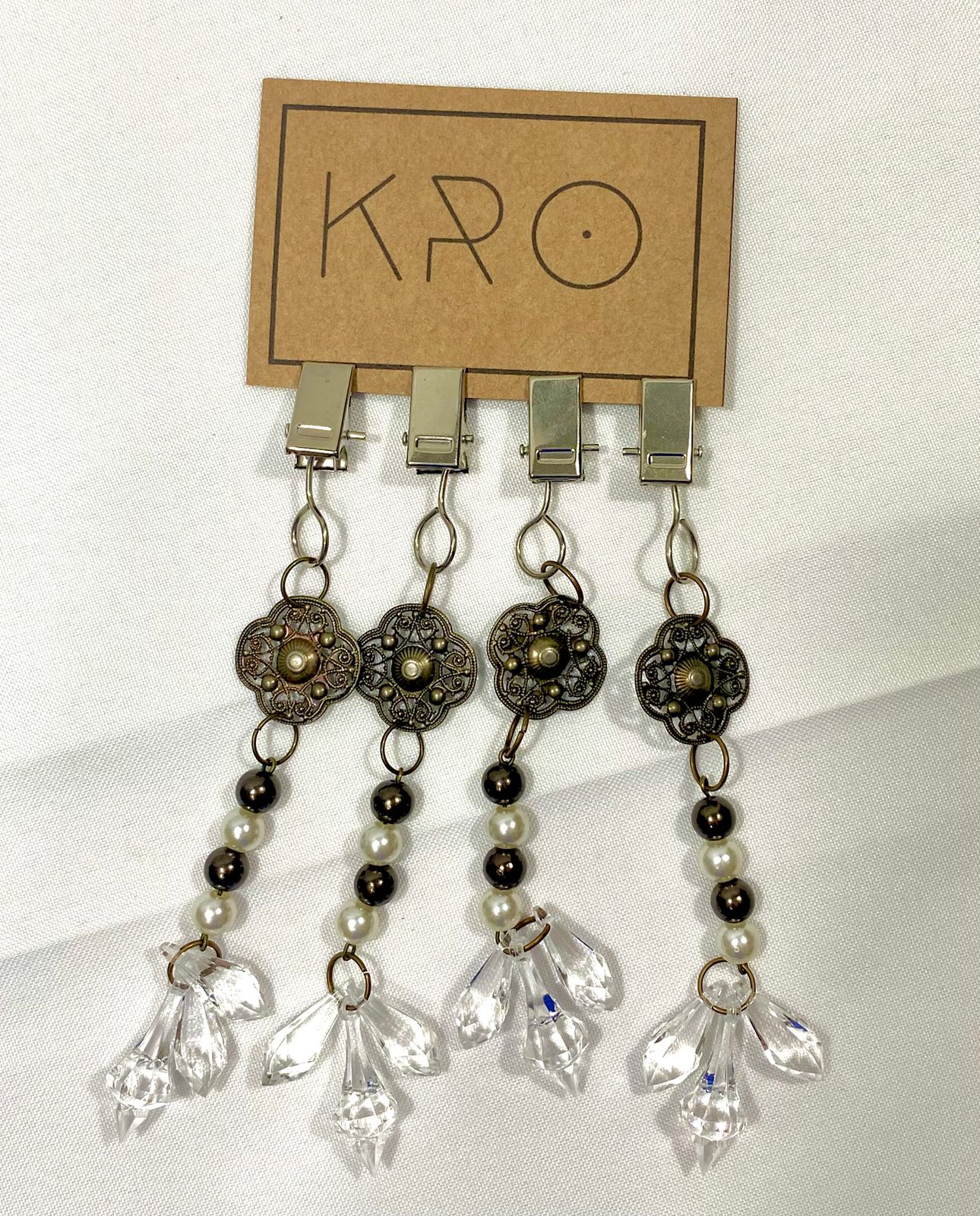 Clip decorativo para manteles 