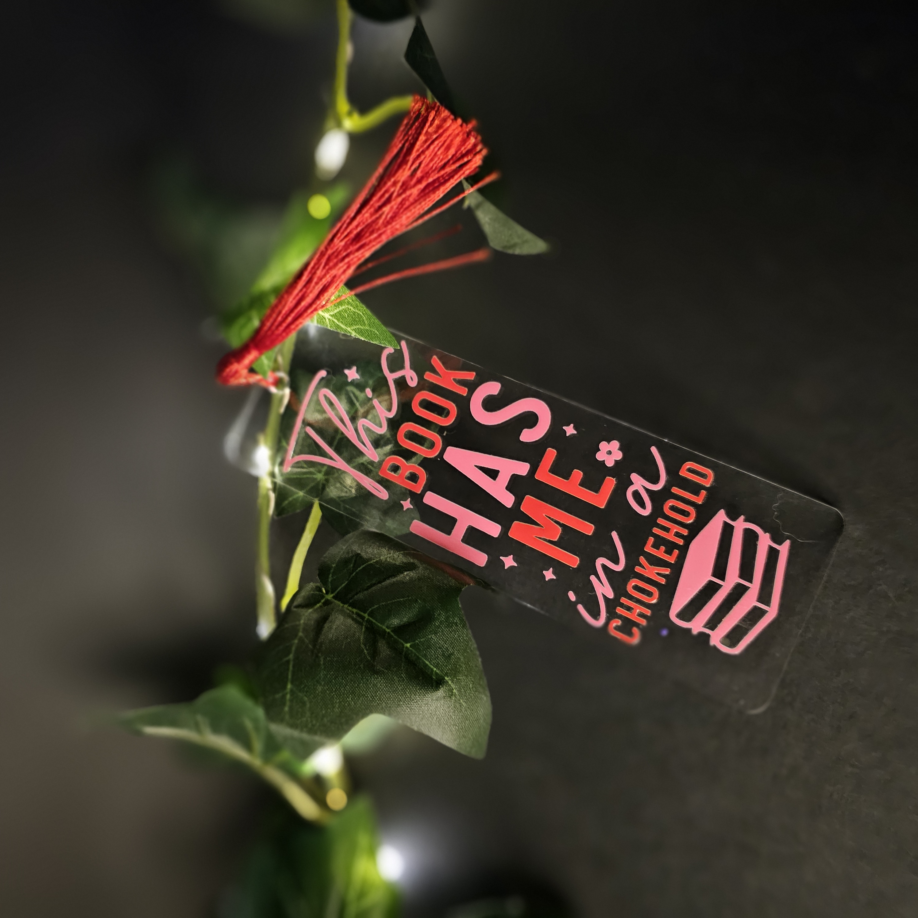 In a Chokehold Acrylic Bookmark