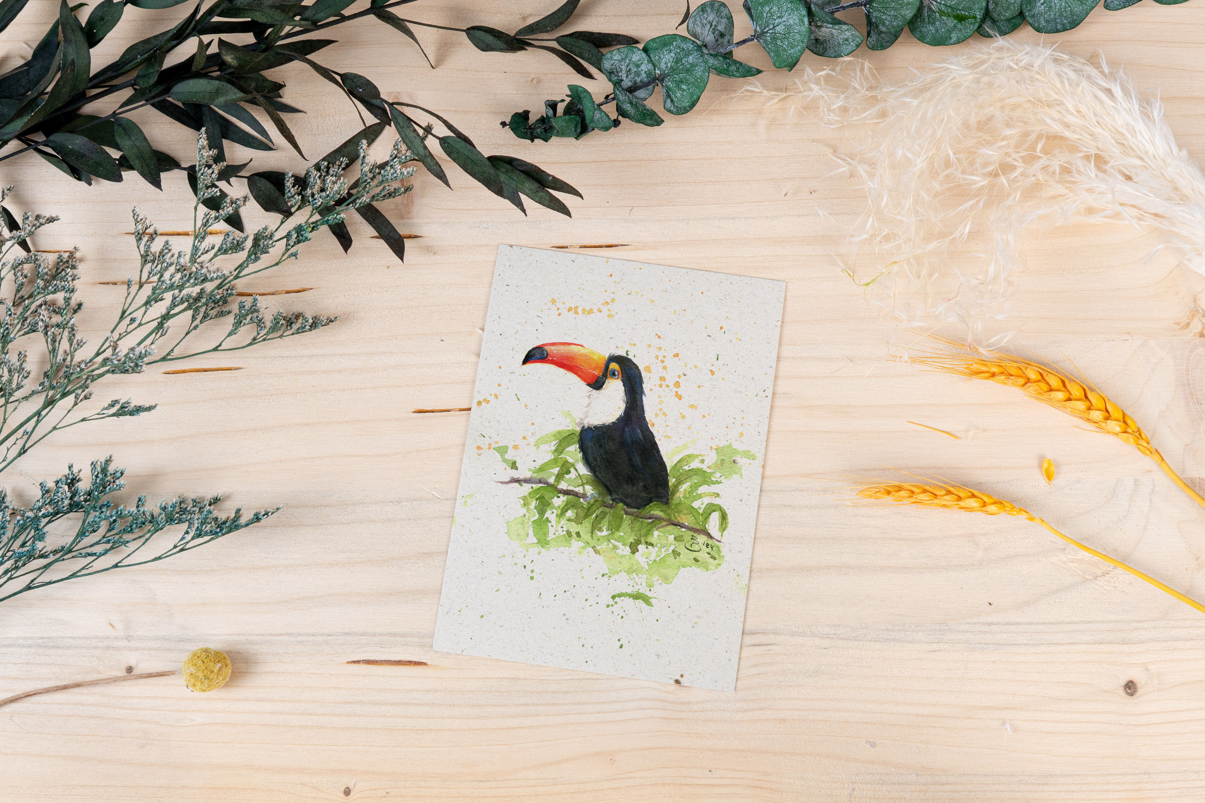 Grußkarte „Ein Schnabel voller Farbe – Tukan im Blättergrün“