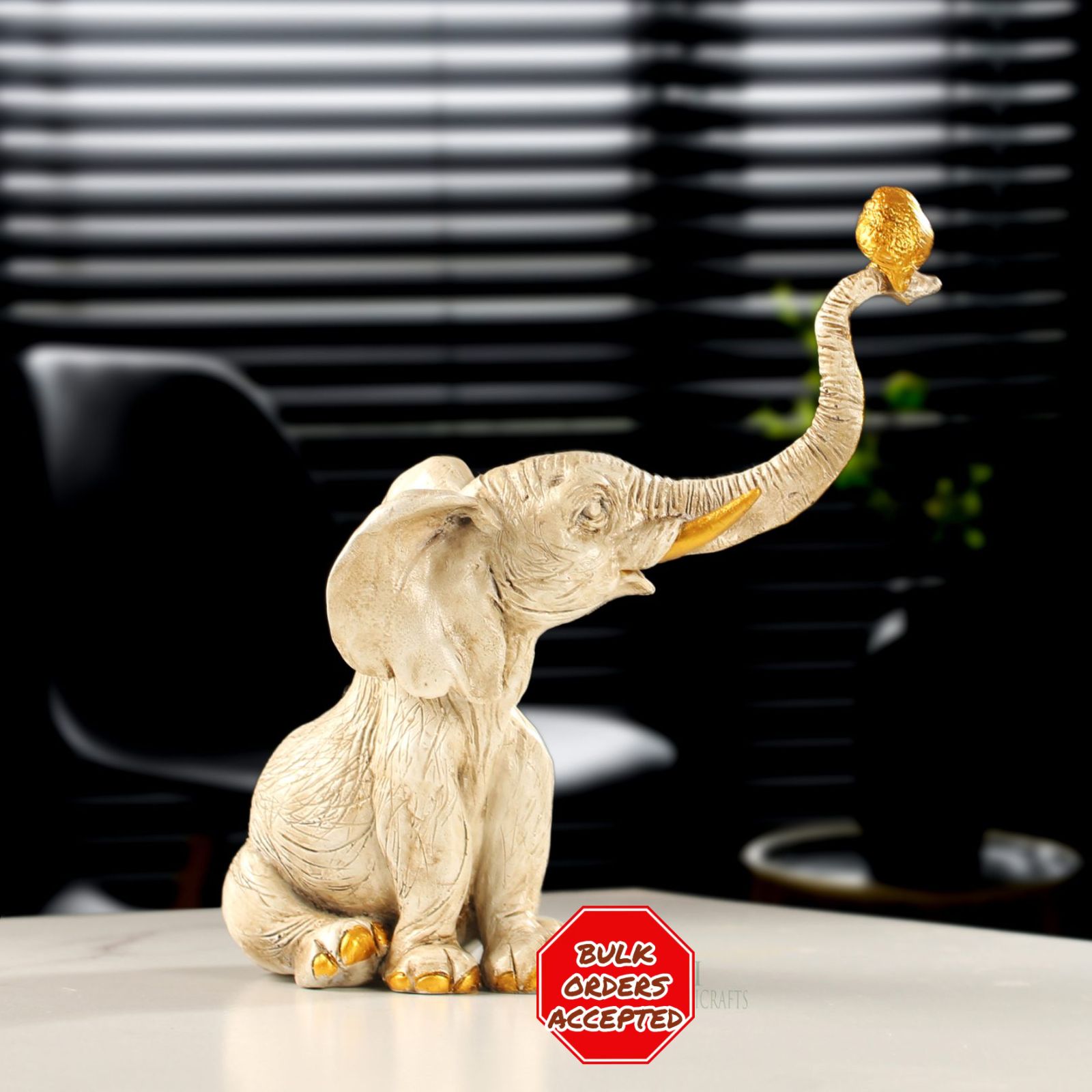 Elephant Figurine with Golden Apple