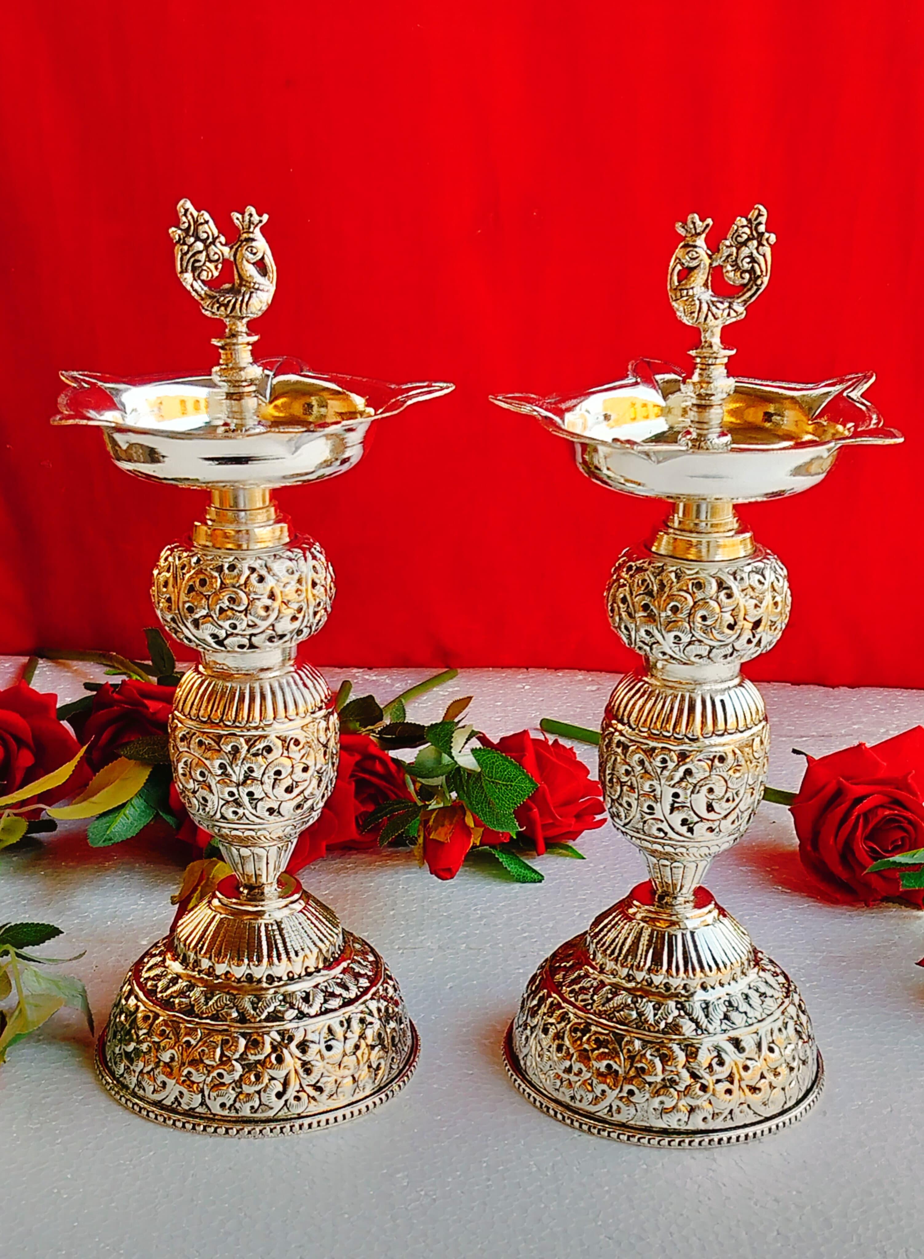 German silver antique peacock diya pair