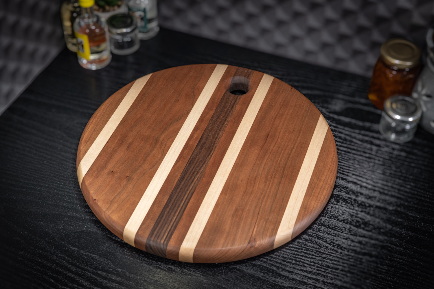 Round Cherry, Walnut and Maple Cutting Board