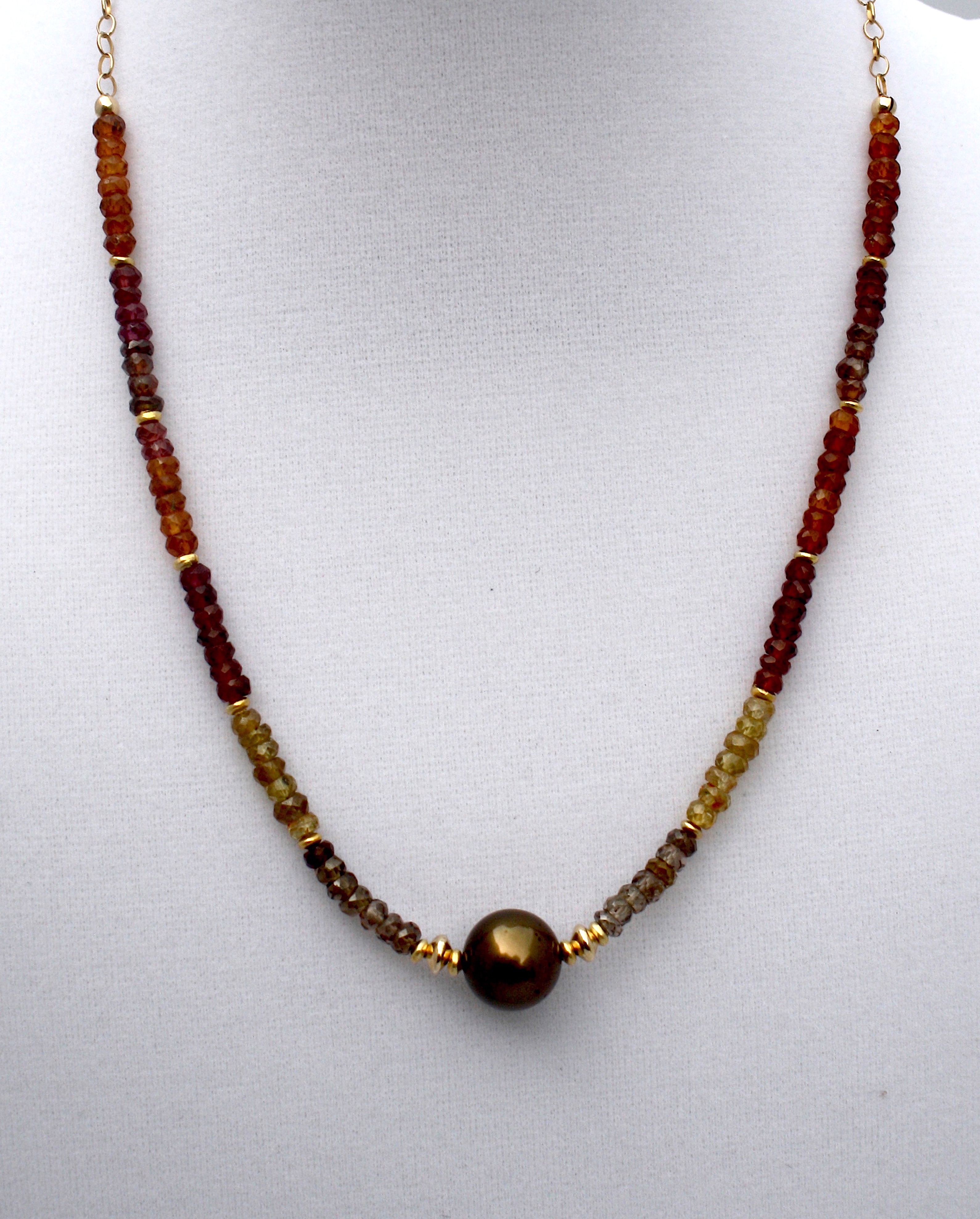 Prized Chocolate Tahitian Pearl with Tourmaline gems