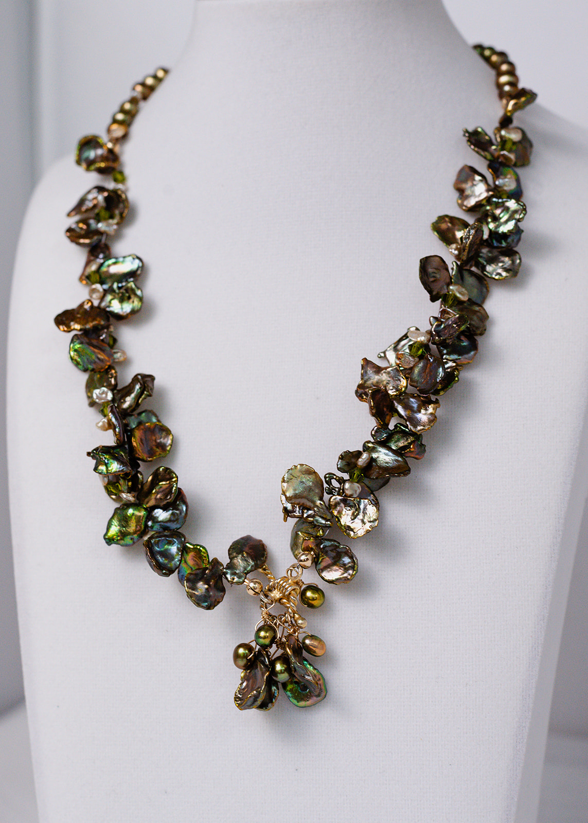 Haku Aloha lei style iridescent green leaf keshi pearl necklace