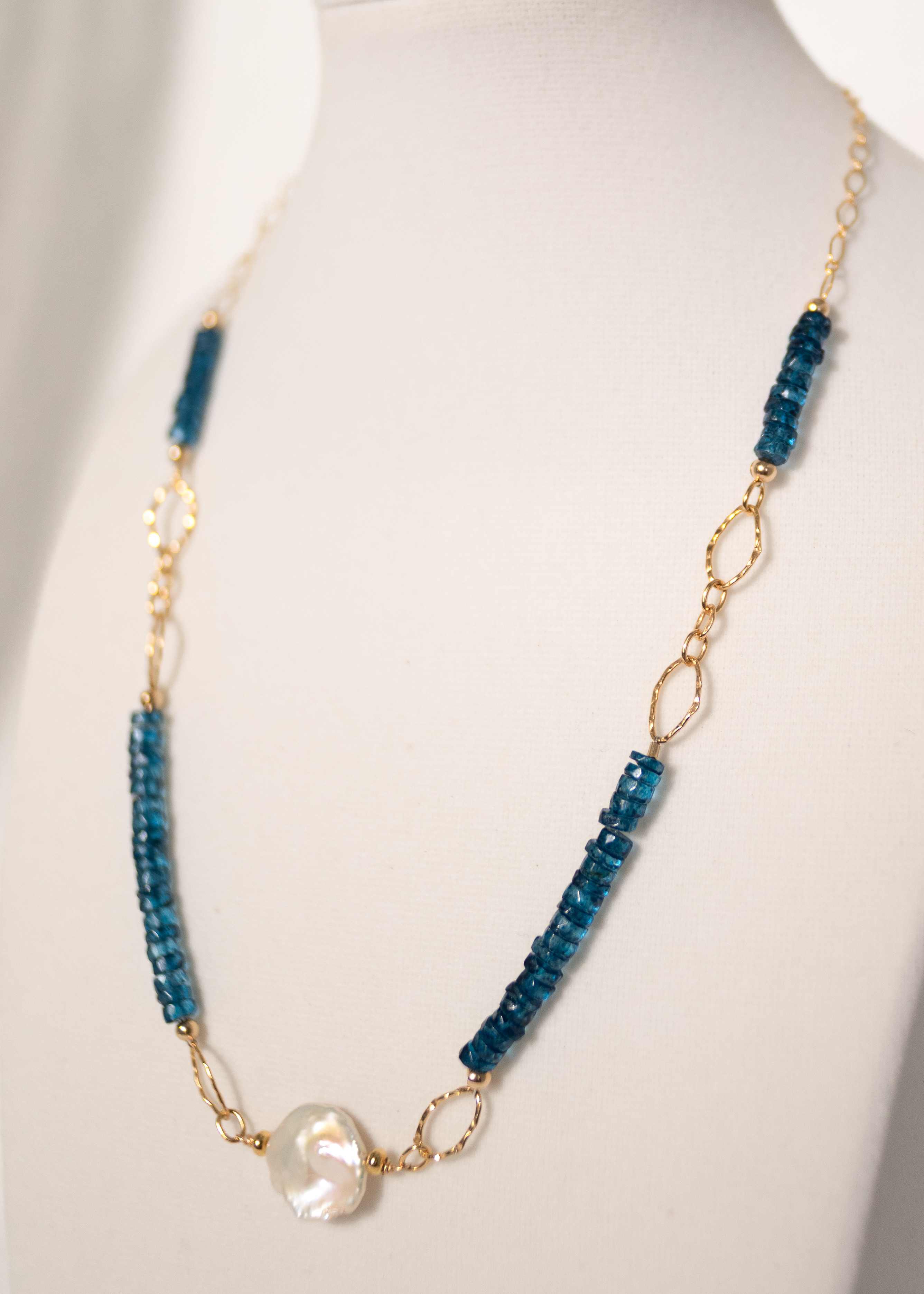 London Blue Topaz gemstones with exquisite coin pearl focus