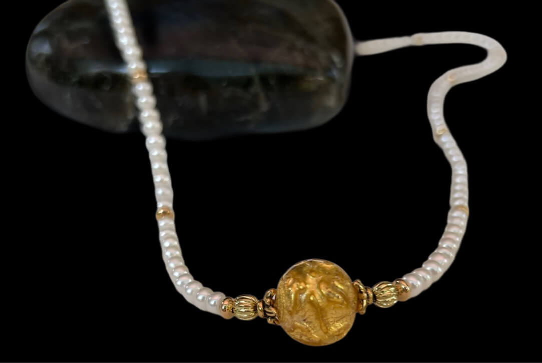 Gold Murano glass feature in classic white pearl necklace