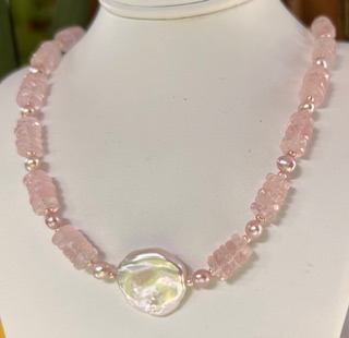 Lustrous baroque pearl with faceted Rose quartz gems
