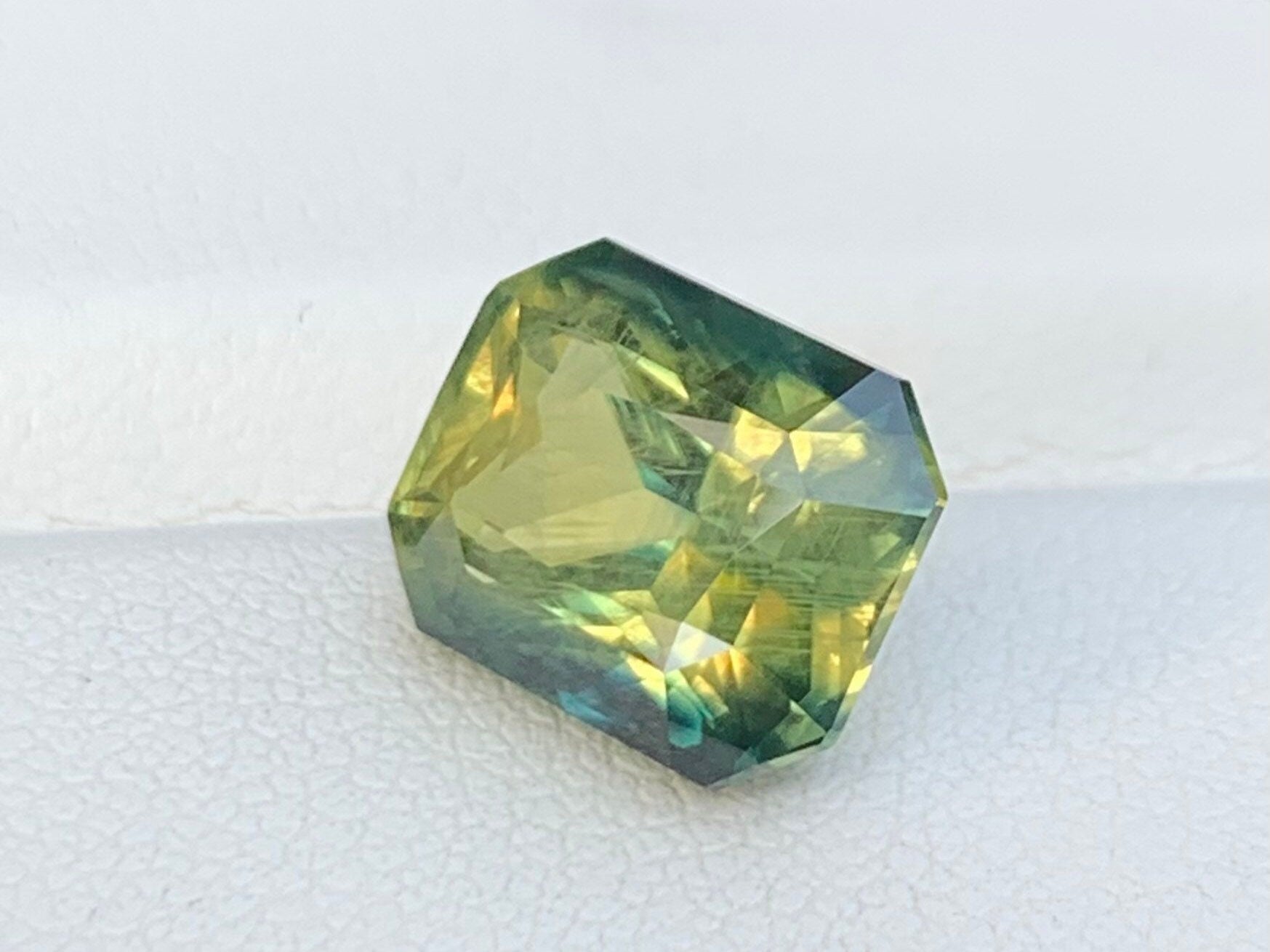 Natural Parti Teal Sapphire 6.86ct - (UH)