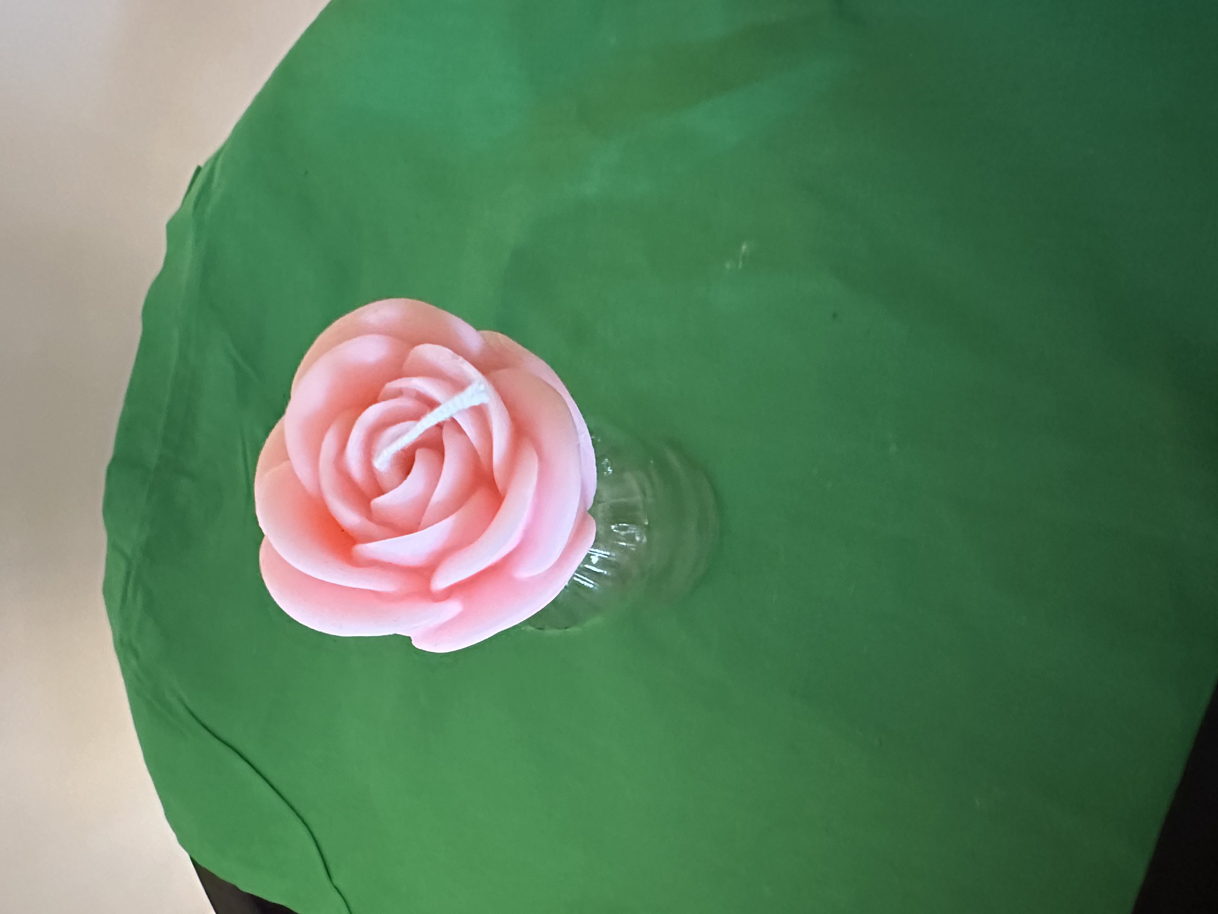 Rosafarbene Rosenkerze