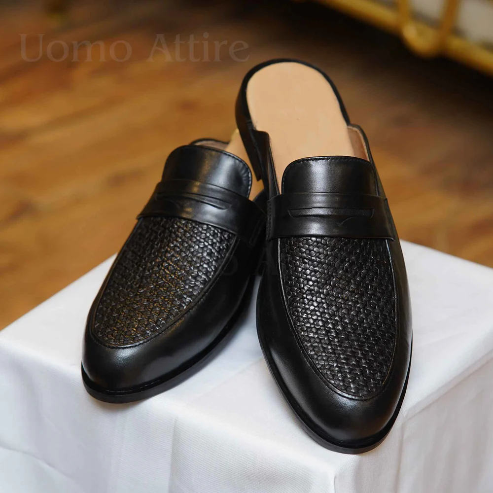 Black backless leather shoe