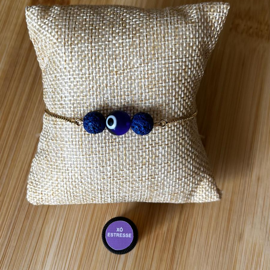 Pulseira Difusora – Aço Inox Dourado, Pedra Vulcânica Azul e Olho Grego