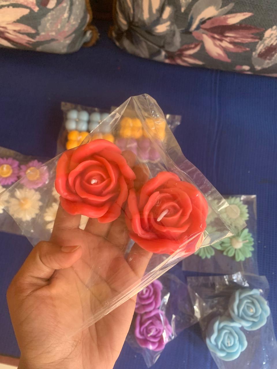 Red rose-shaped candles
