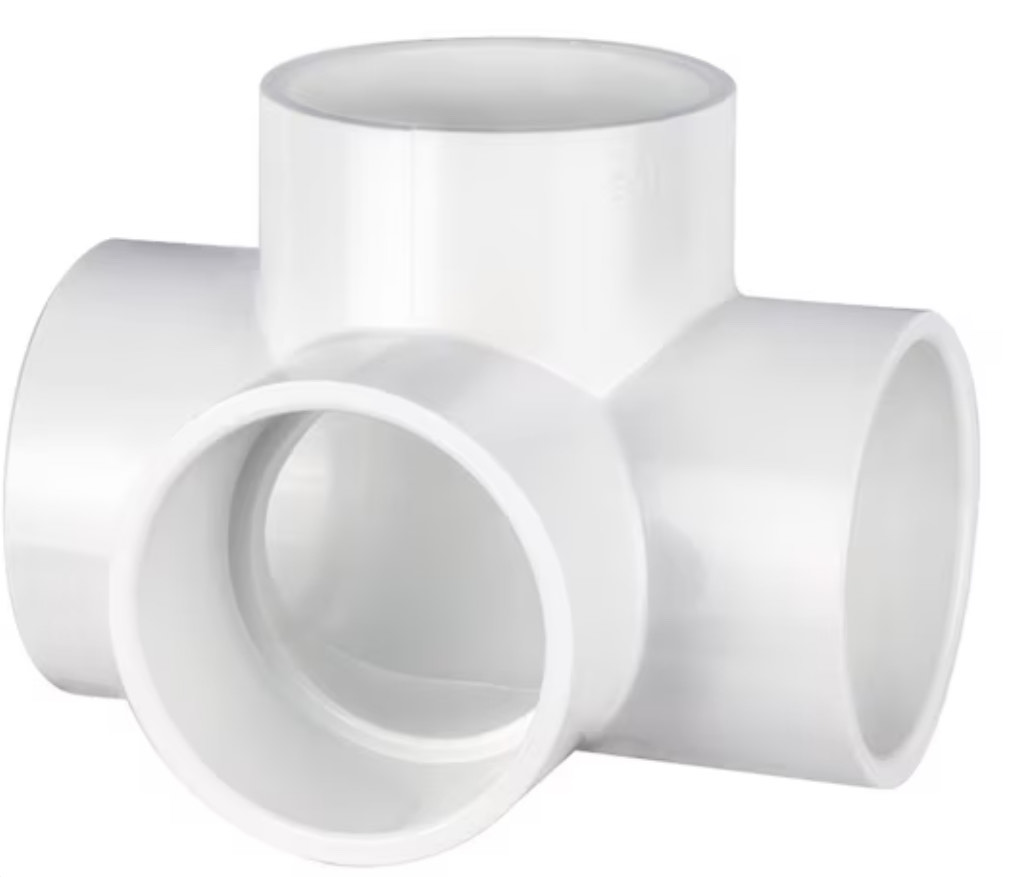 Four-way PVC cross connector for piping systems