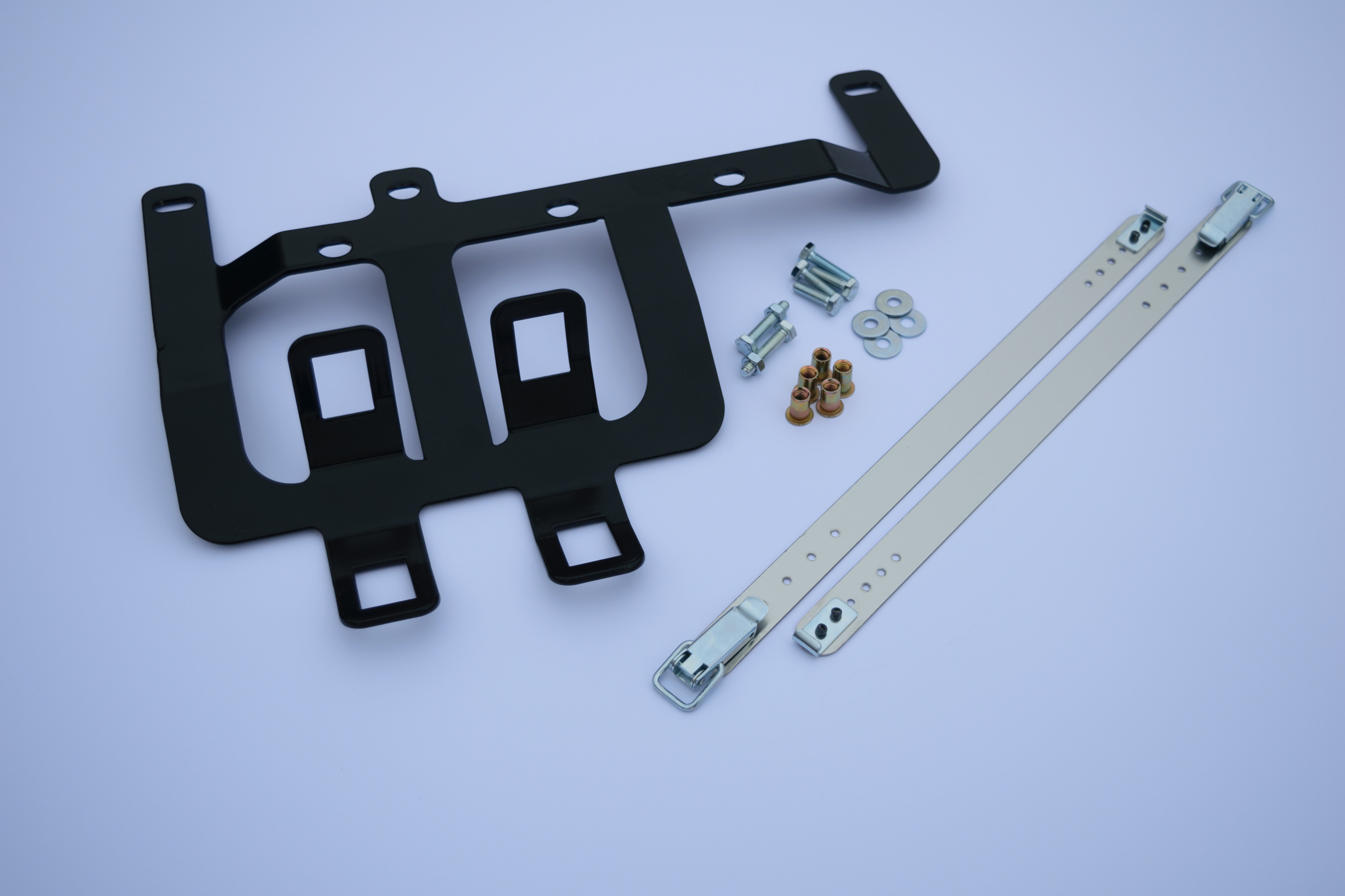 Passenger seat fire extinguisher bracket set