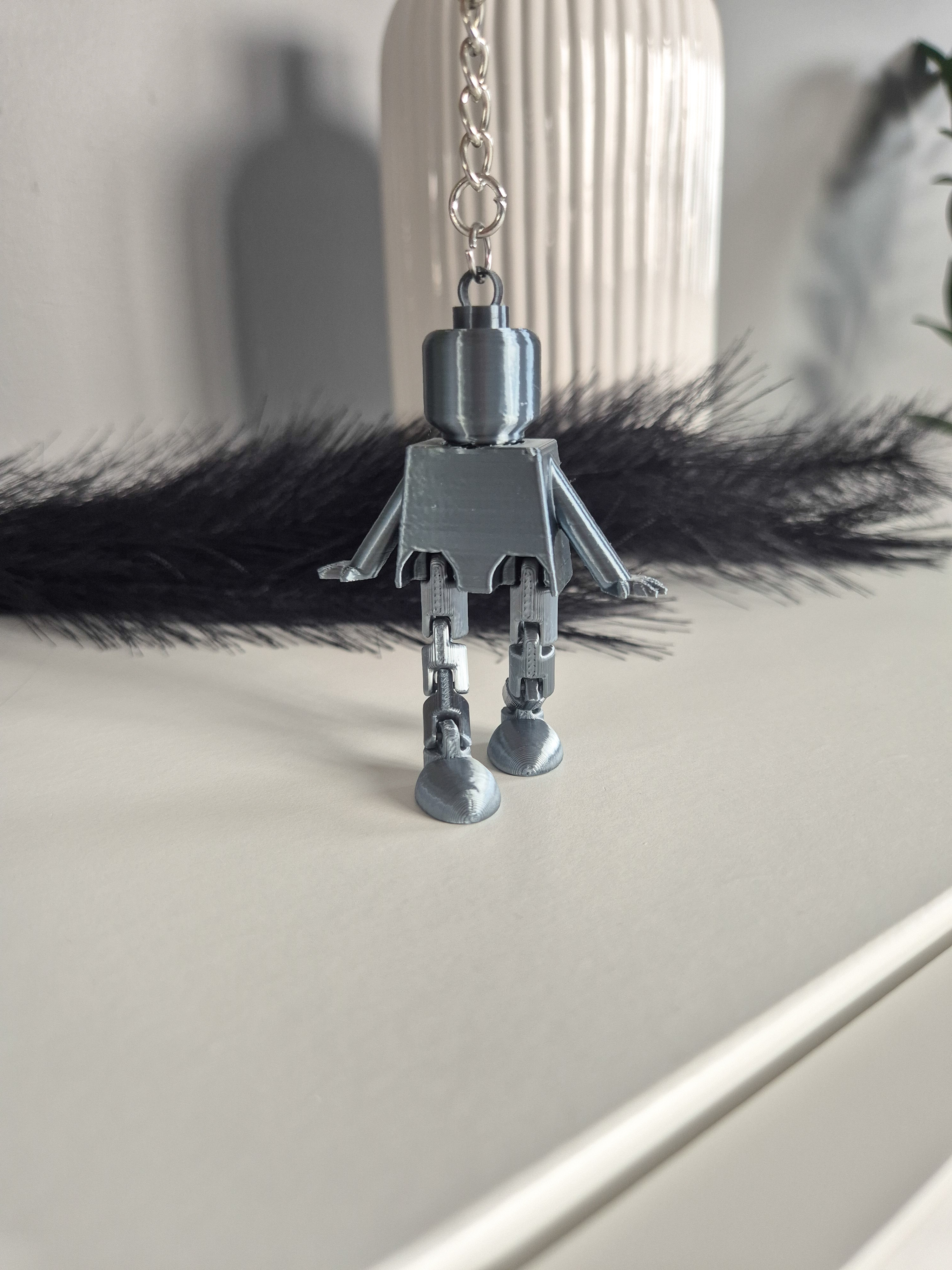 Robotų formos pakabukas