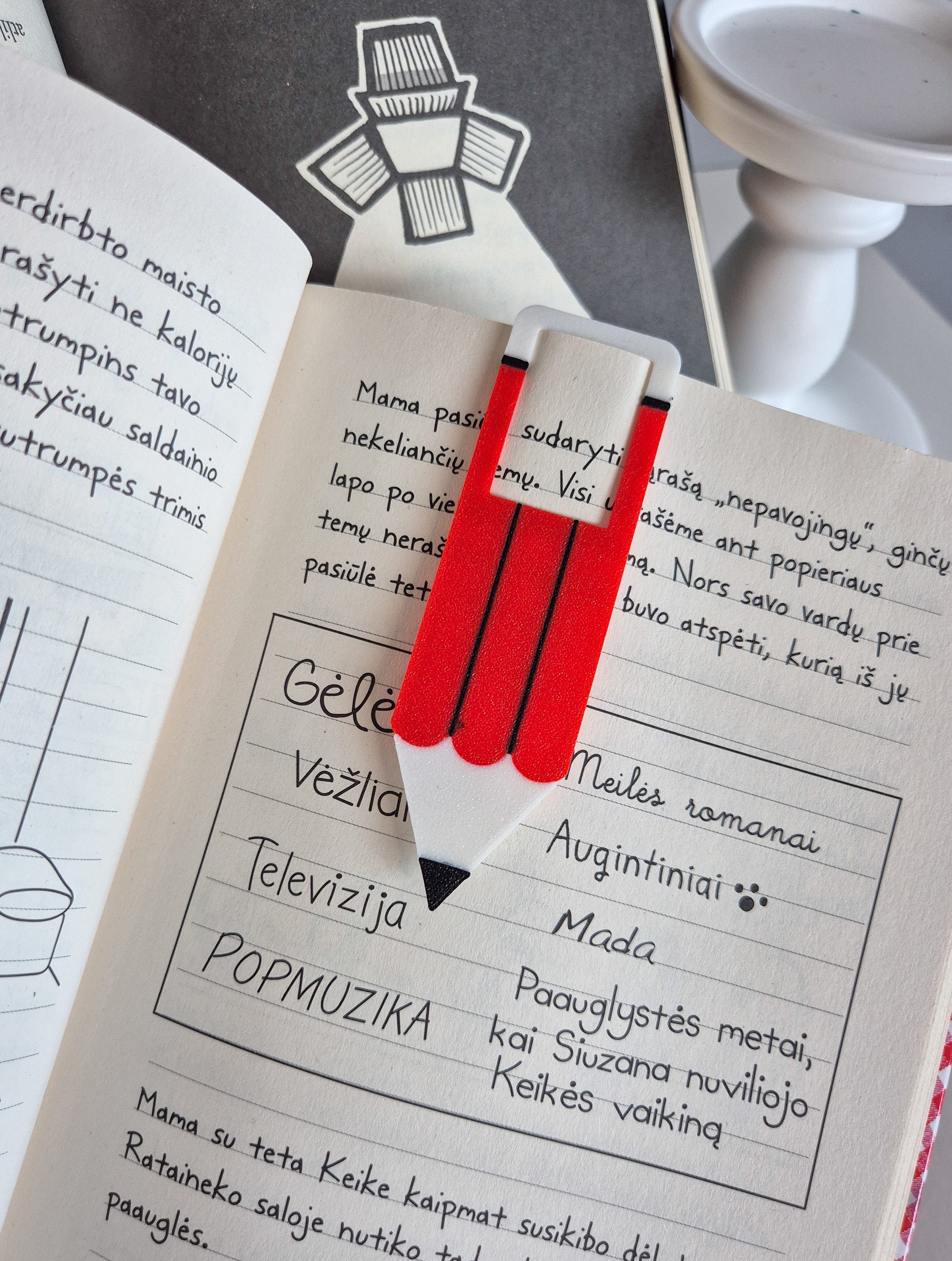 Knygos skirtukas su motyvuojančia žinute