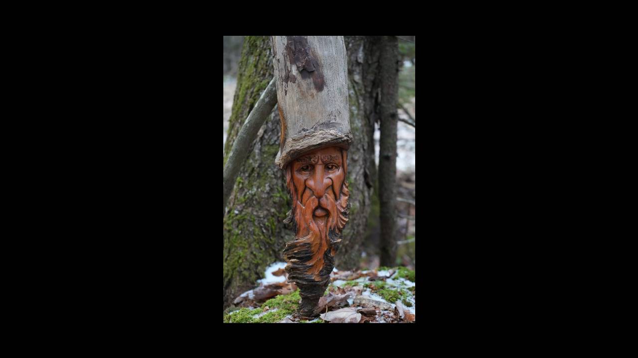 SOLD Face carving in pine knot